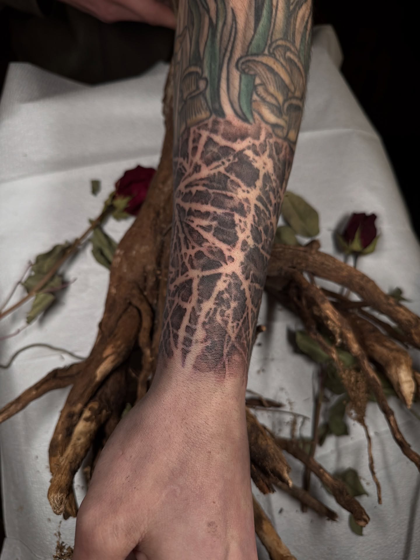 Root system black and grey tattoo on the forearm by Jamie Draven 🐺
