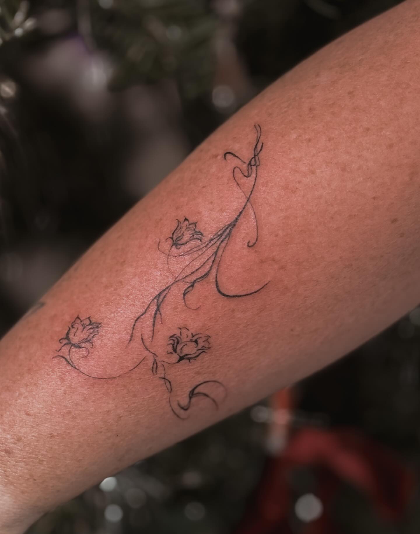 Floral vine fine line tattoo on the forearm by π»ππ π
ππππ Tattoo Artist, Las Vegas, Nevada