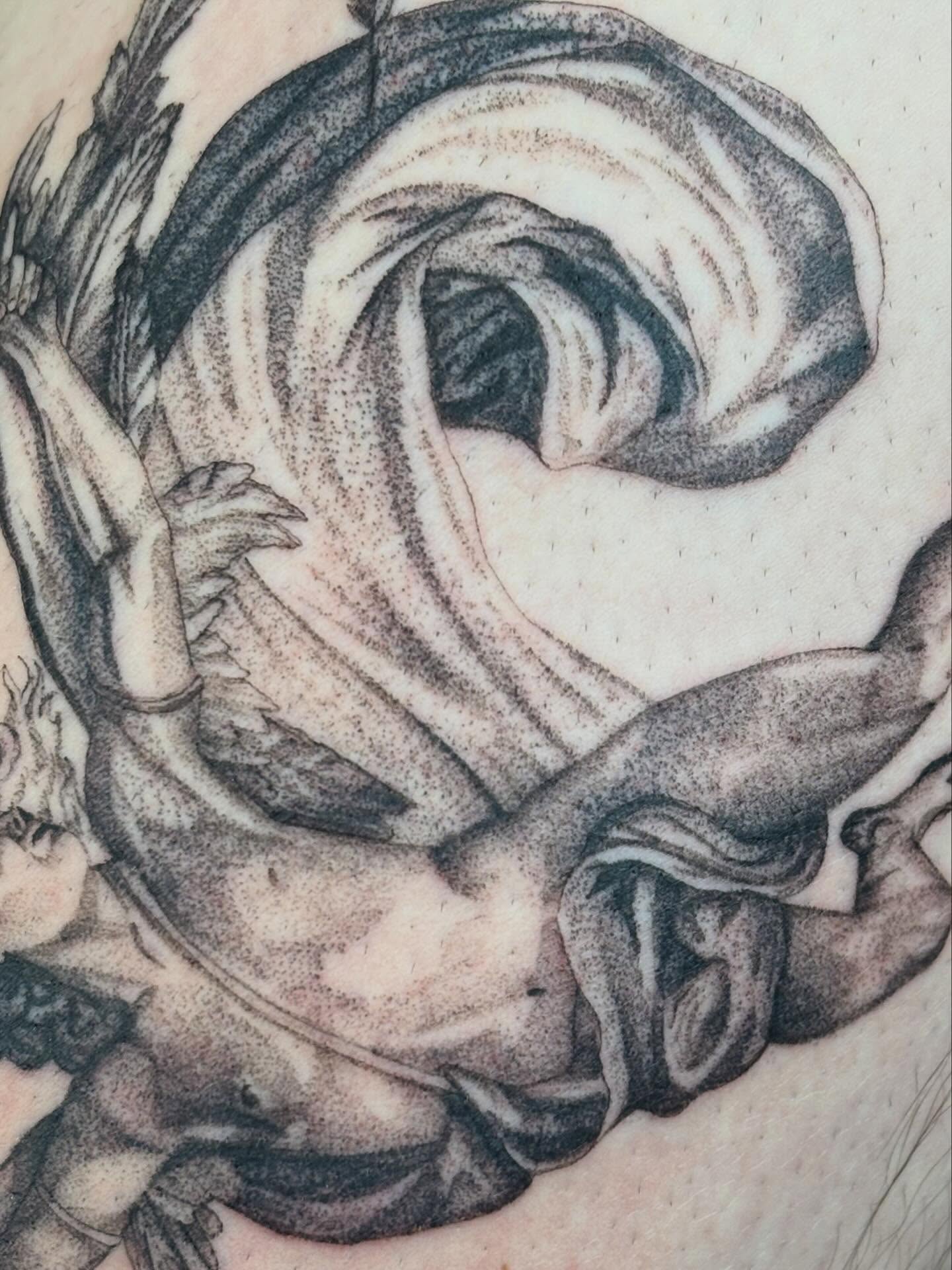 Dragon dotwork tattoo on the thigh by Jazzlyn Hous
