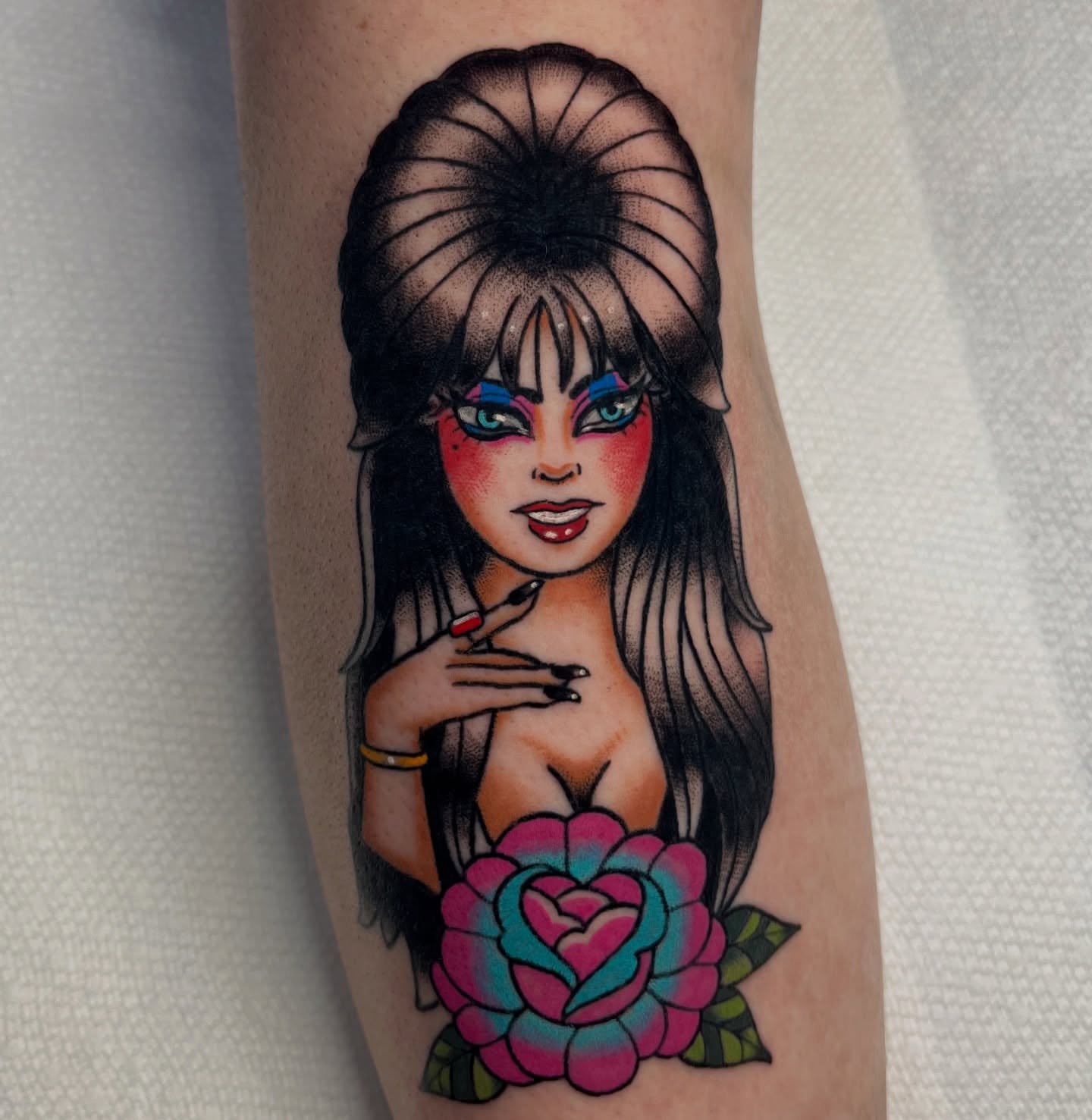 Woman with flower dotwork tattoo on the forearm by Alena McDonald