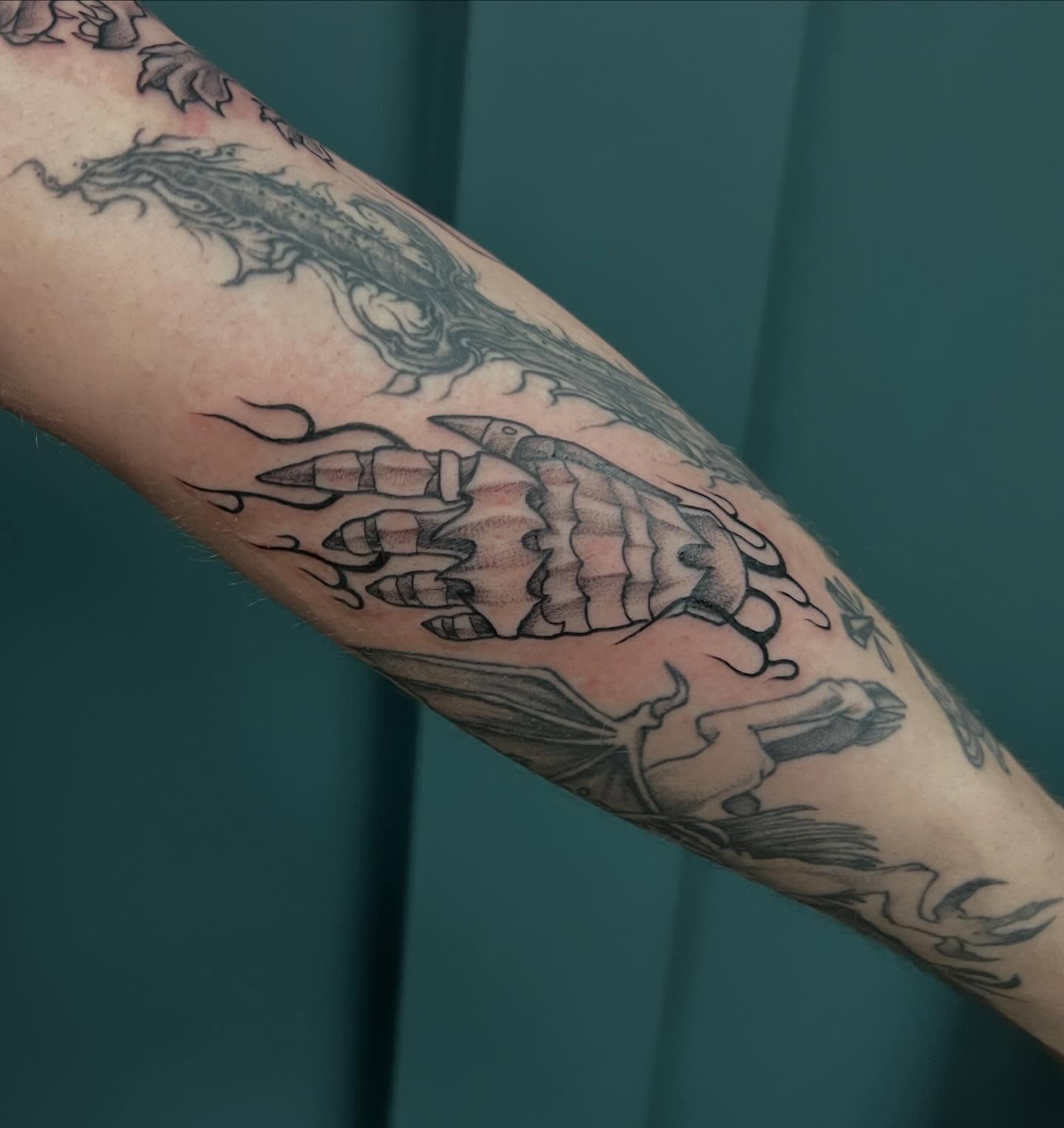 Hand with rockets black and grey tattoo on the forearm by Callie πͺ