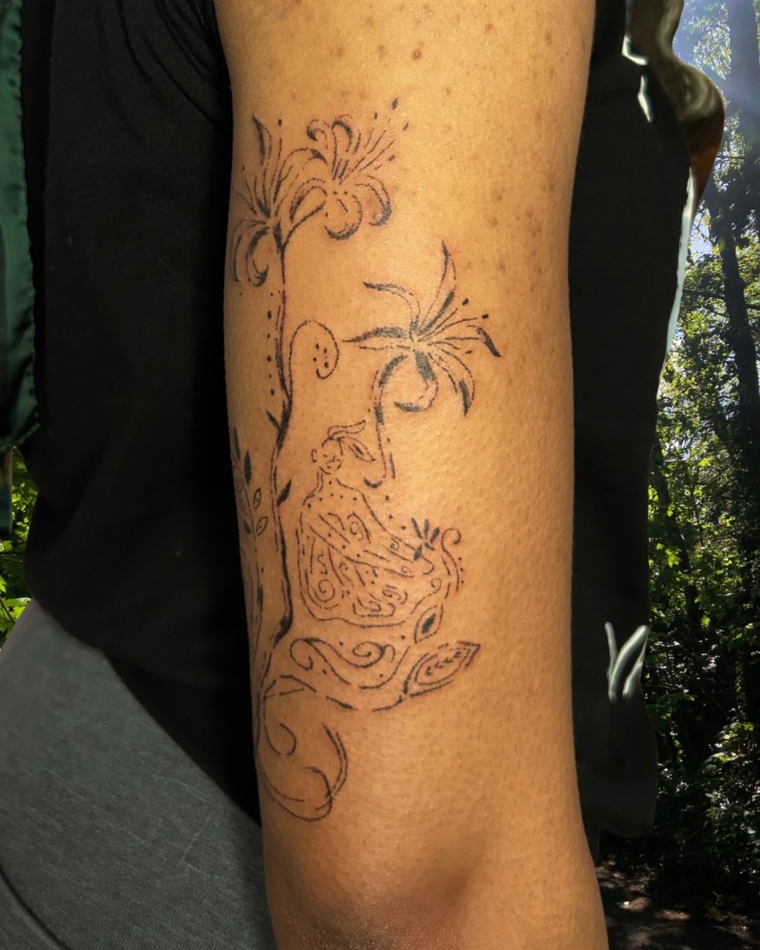 Floral and abstract design dotwork tattoo on the forearm by wanderfernfairy