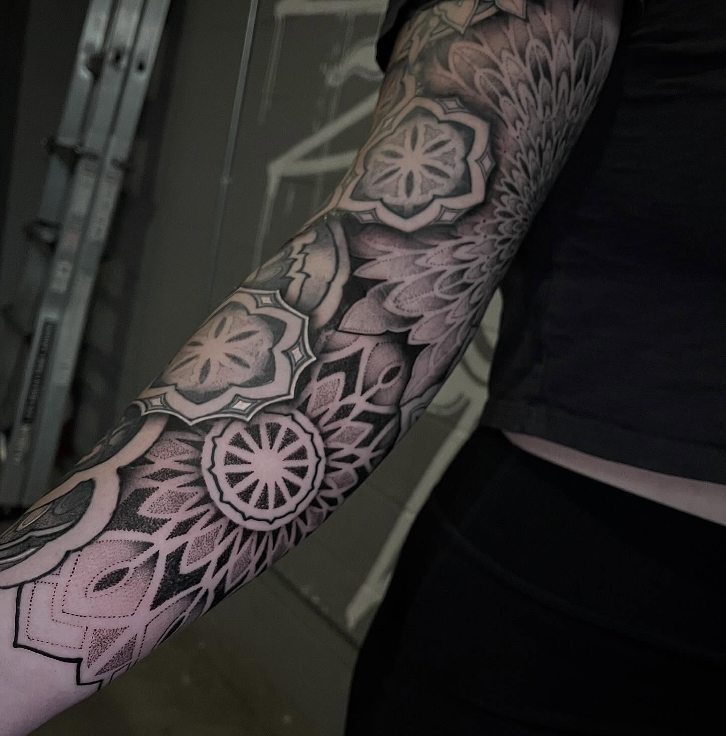 Geometric patterns geometric tattoo on the forearm by Brandon Mola, Chicago, Illinois