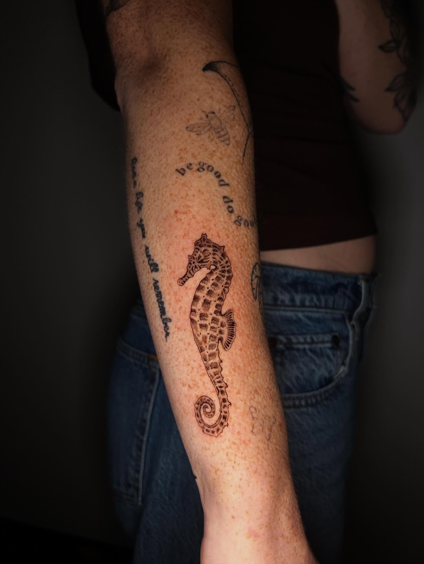 Seahorse black and grey tattoo on the forearm by J