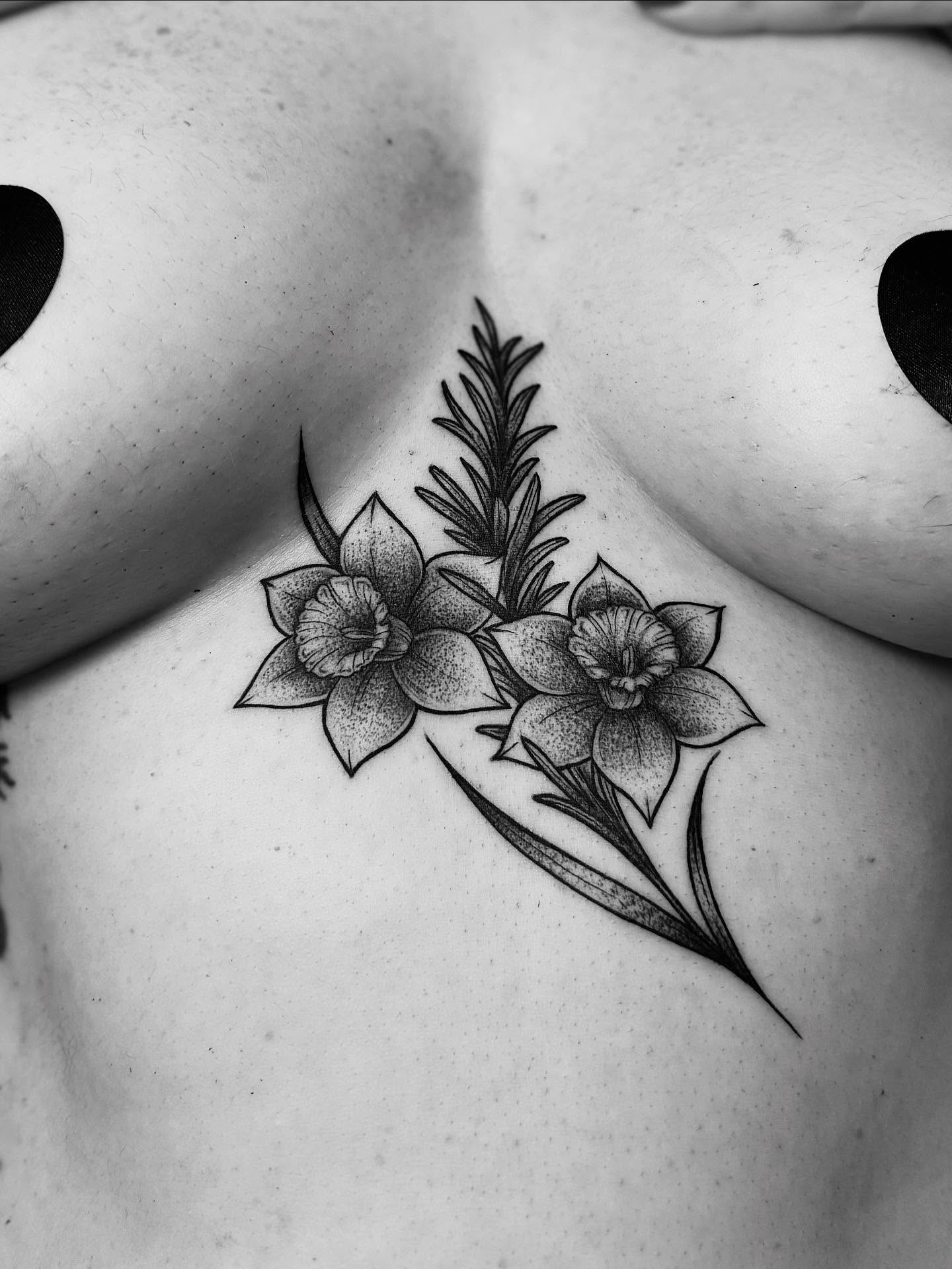 Orchids and rosemary dotwork tattoo on the chest by MISO ⟡ Bay Area Tattoo Artist