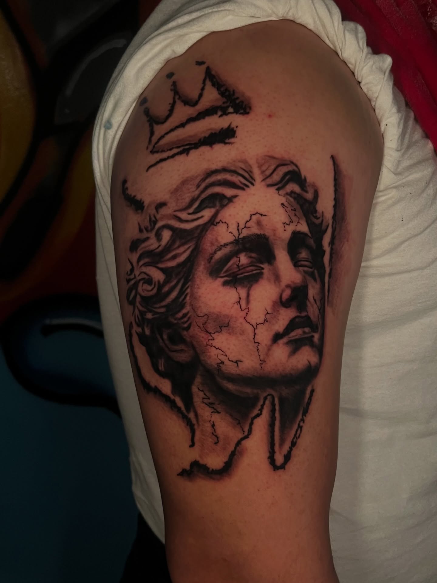 Statue head realism tattoo on the shoulder by Unknwn Ink ⭐️