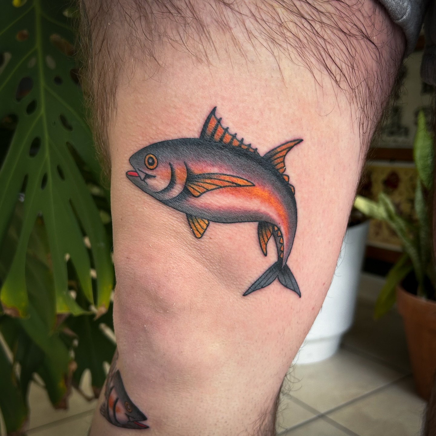 Fish American traditional tattoo on the thigh by Jessica Oram Brockman, Dayton, Ohio