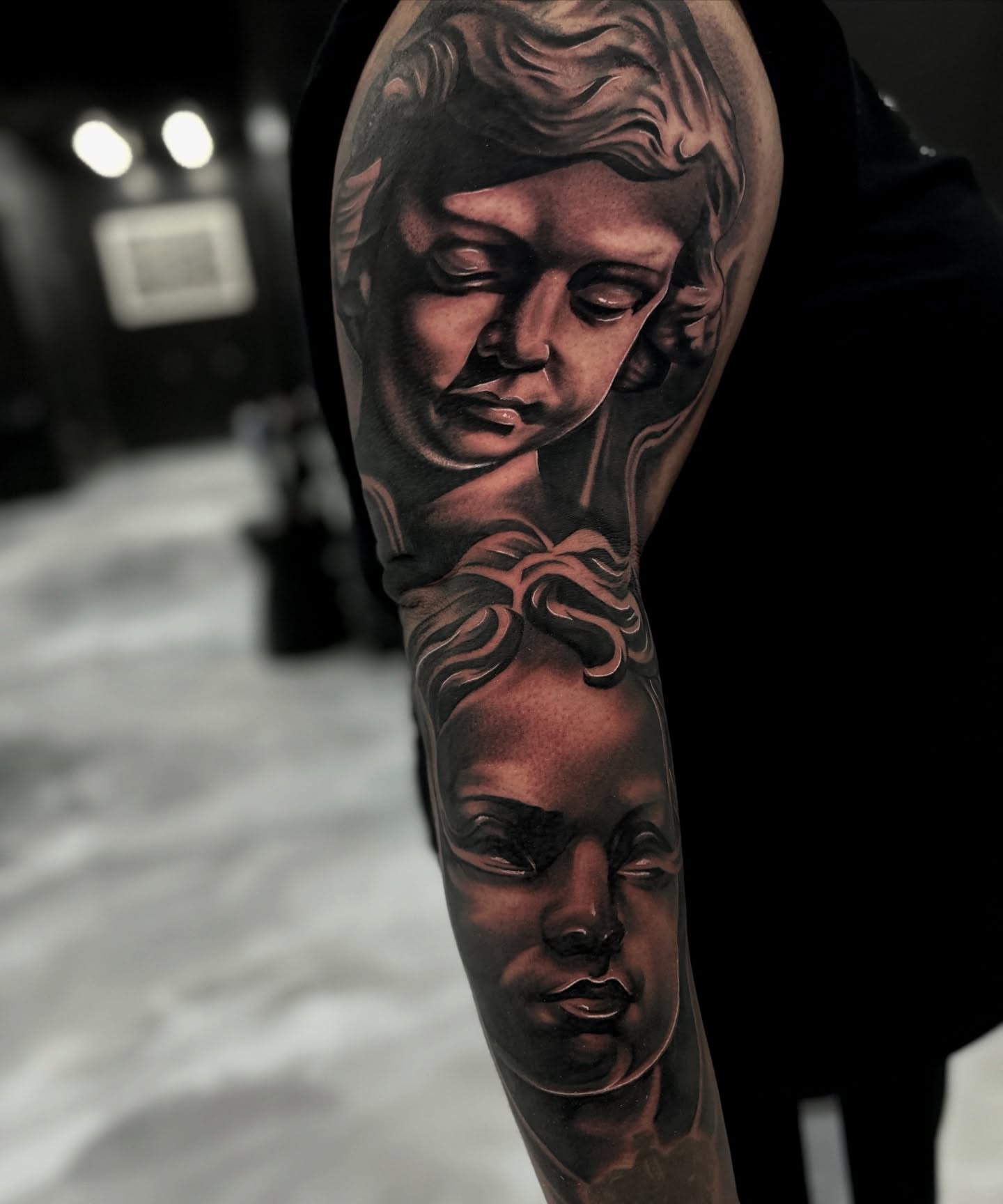 Portrait realism tattoo on the forearm by Jesse Temores