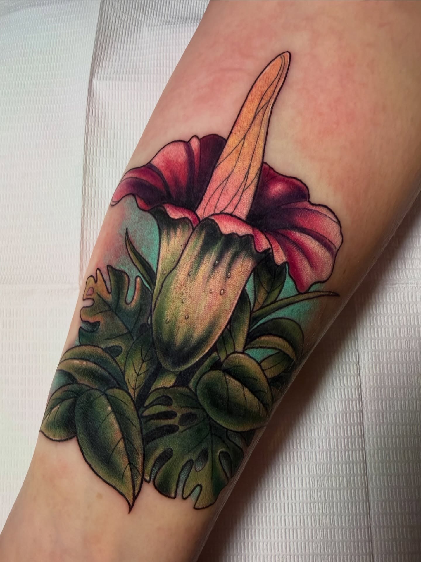 Calla lily realism tattoo on the forearm by Tattoos By Lola Cavotta, Willoughby, Ohio