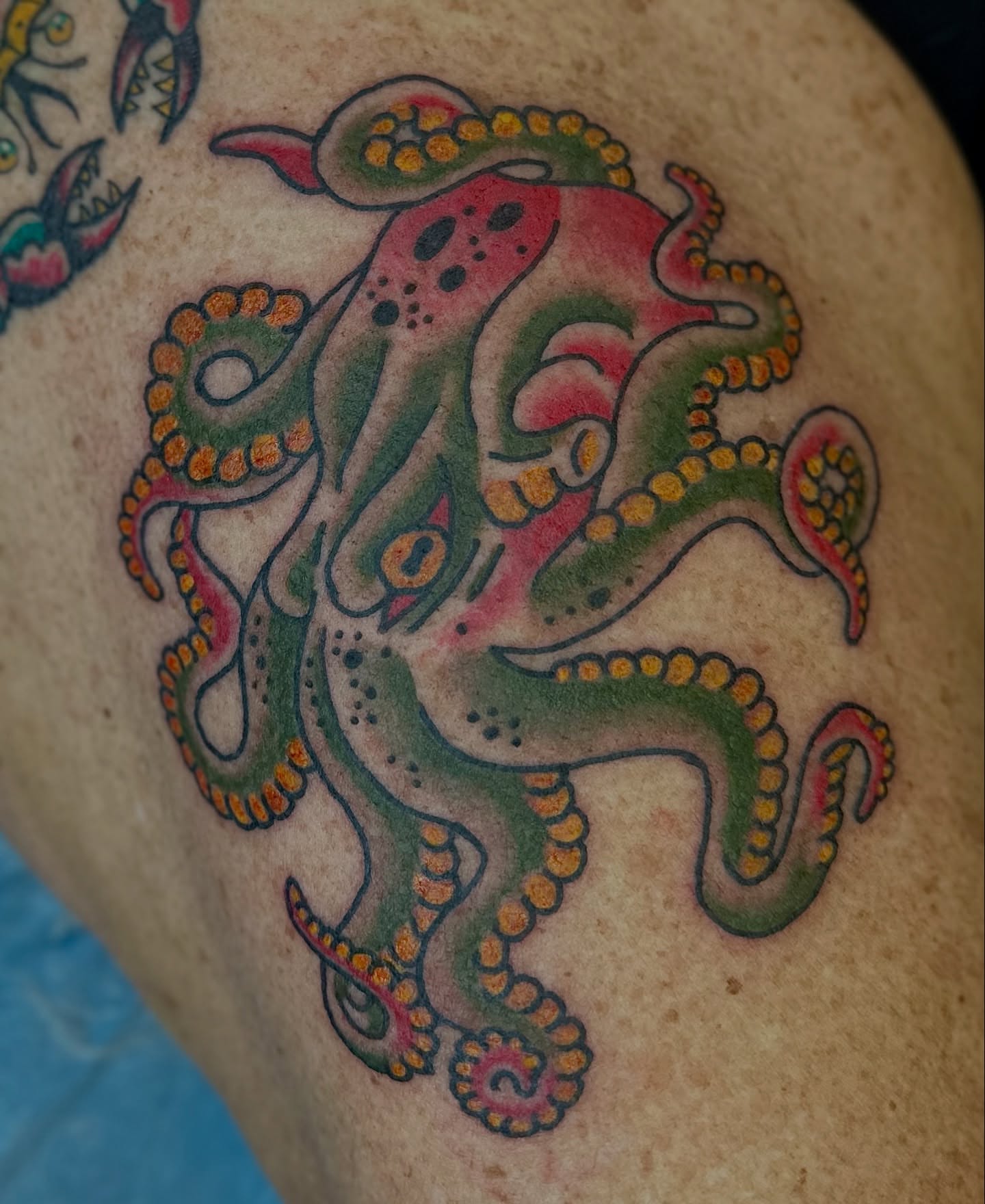 Octopus American traditional tattoo on the thigh by Hayley Hendrick