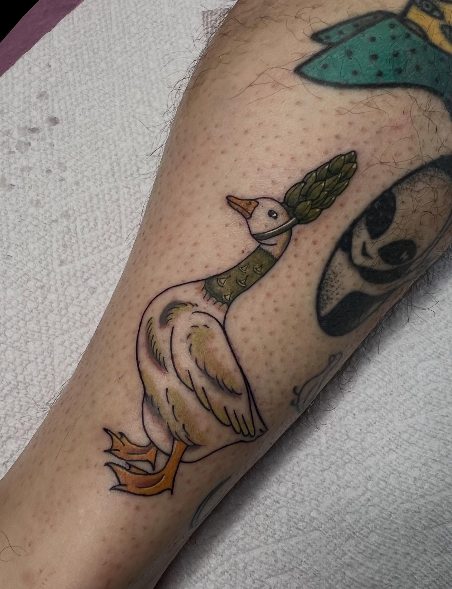 Duck with asparagus American traditional tattoo on the forearm by Kahlan ⍟