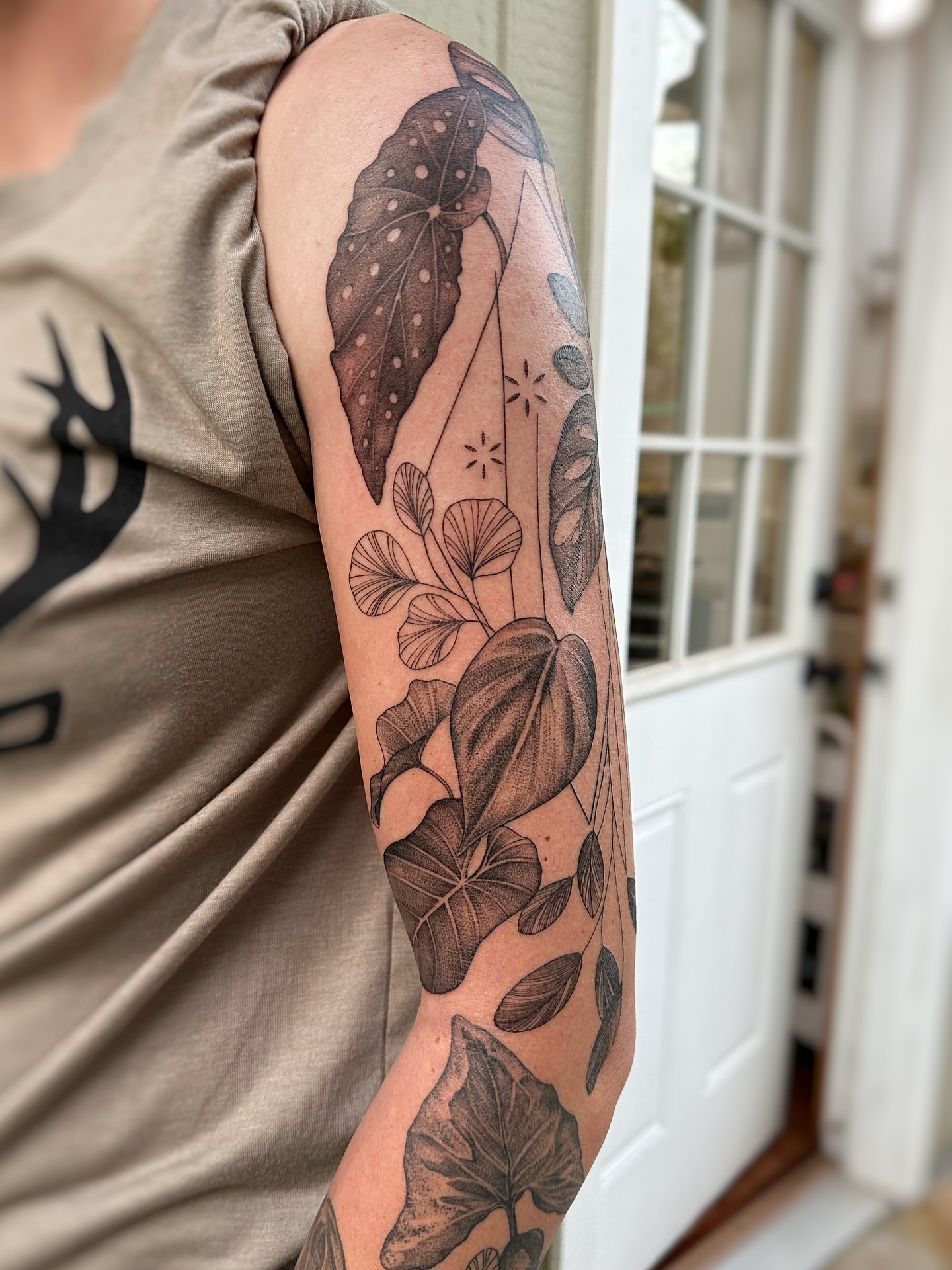 Tattoo by @art.byjaclyn — dotwork, black_and_grey