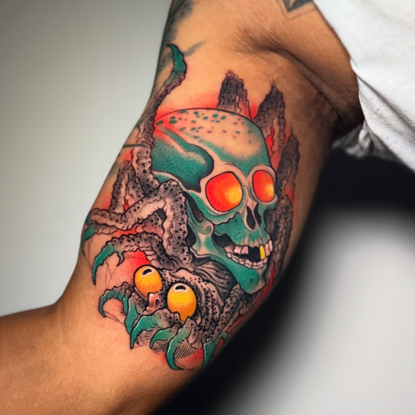 Skull with glowing eyes dotwork tattoo on the forearm by Meza Cruz