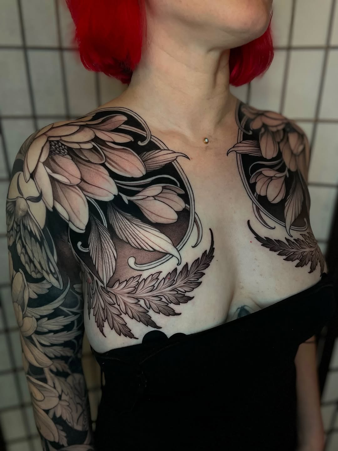Floral and foliage chest piece Japanese tattoo on the chest by Madelyn Roberts, Bellingham, Washington
