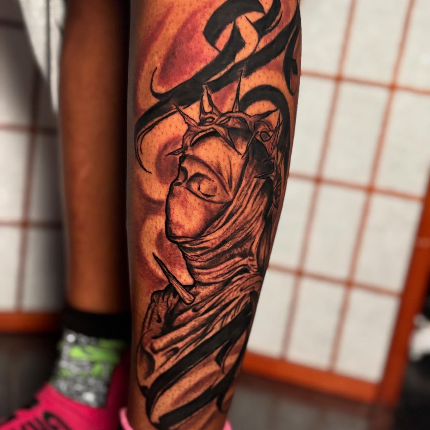 Statue of liberty realism tattoo on the forearm by D. Davis
