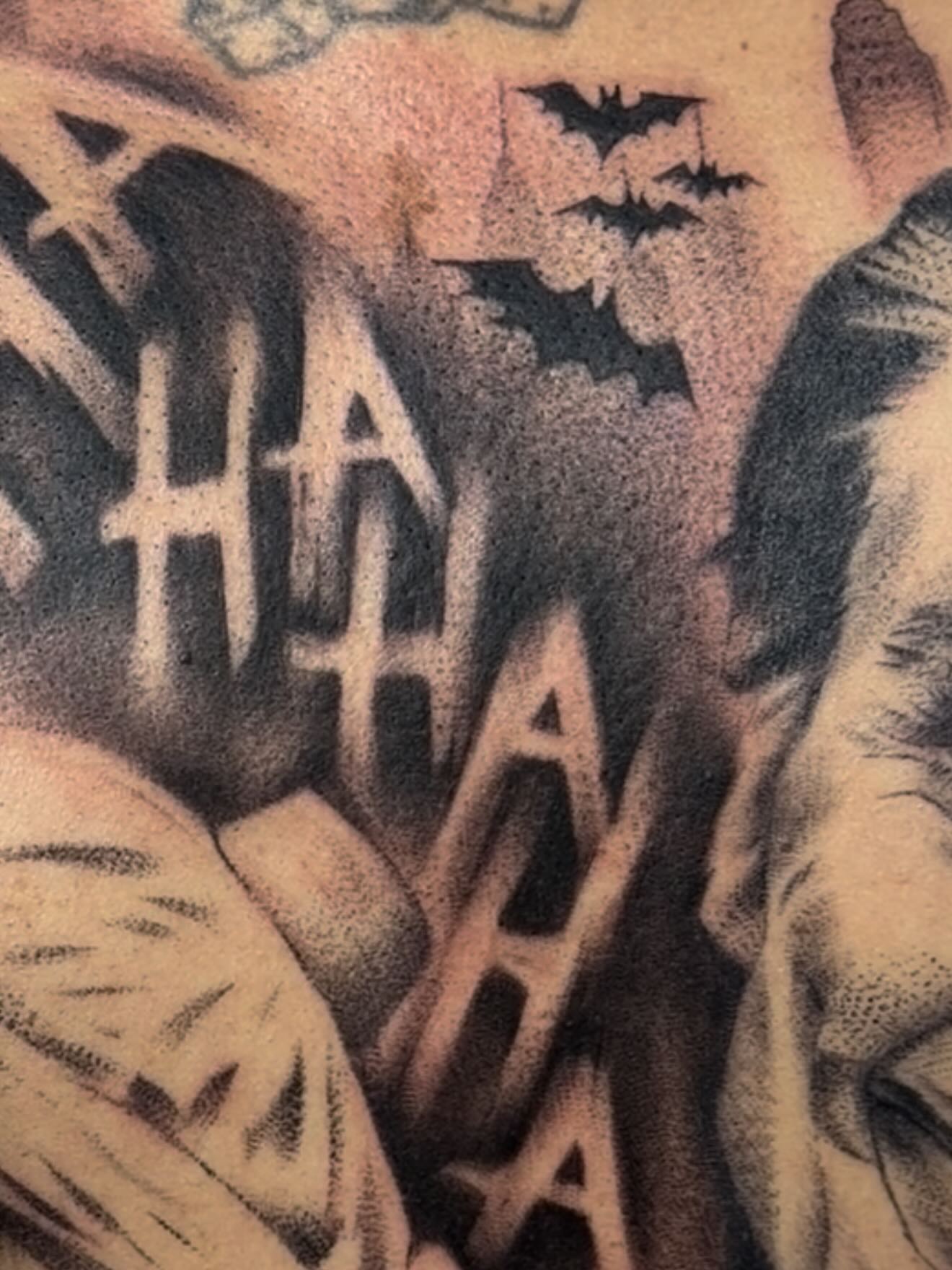 Joker's laugh dotwork tattoo on the chest by Jericho Las Vegas tattoo artist, Las Vegas, Nevada