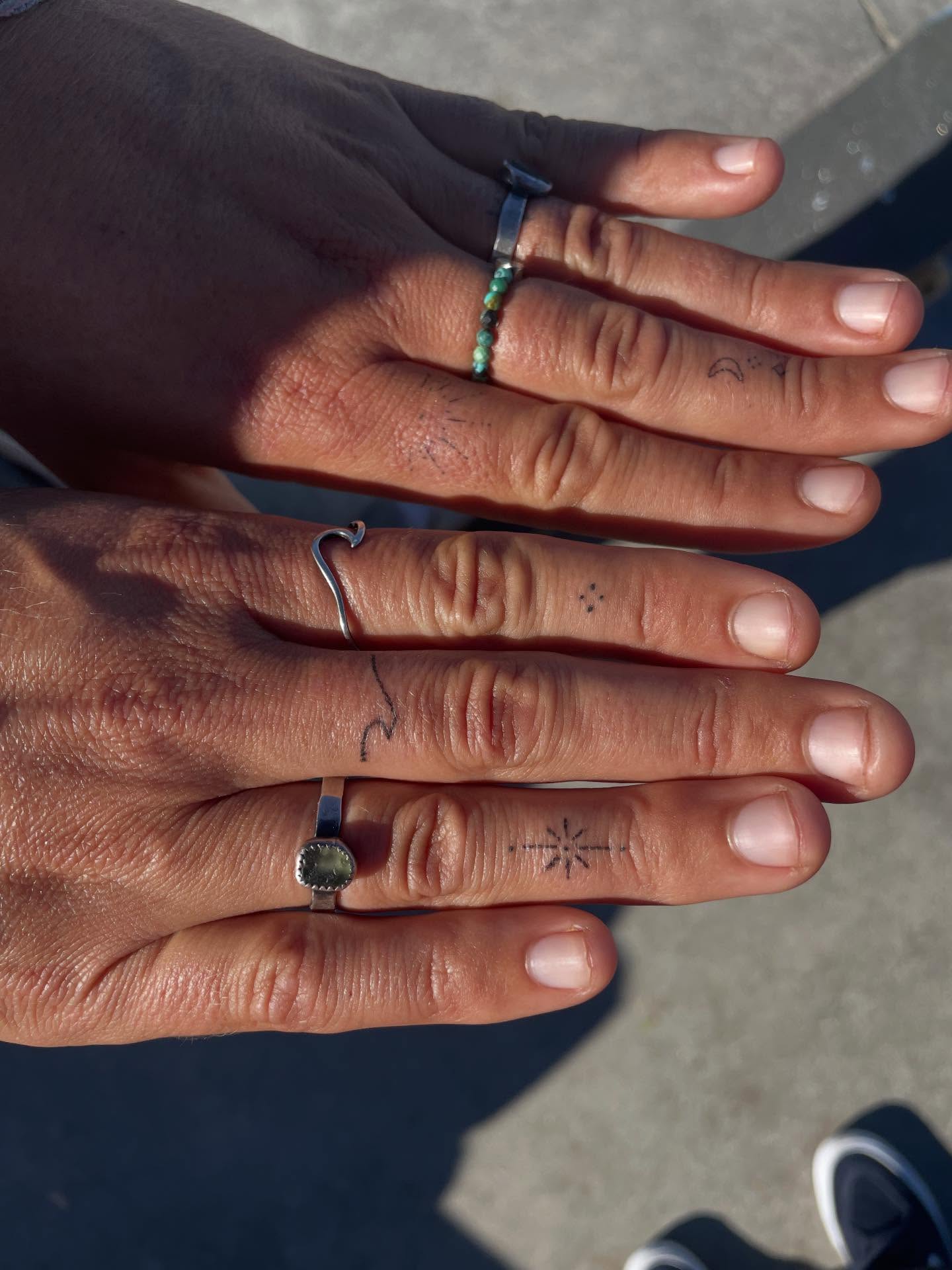 Dots and line dotwork tattoo on the hand by Alyssa