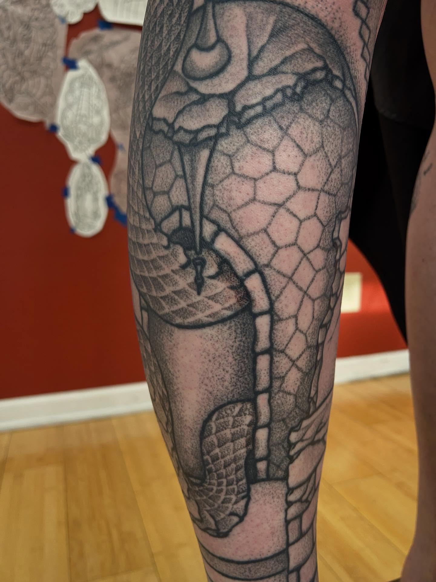 Dragon dotwork tattoo on the forearm by Matthew Crimson