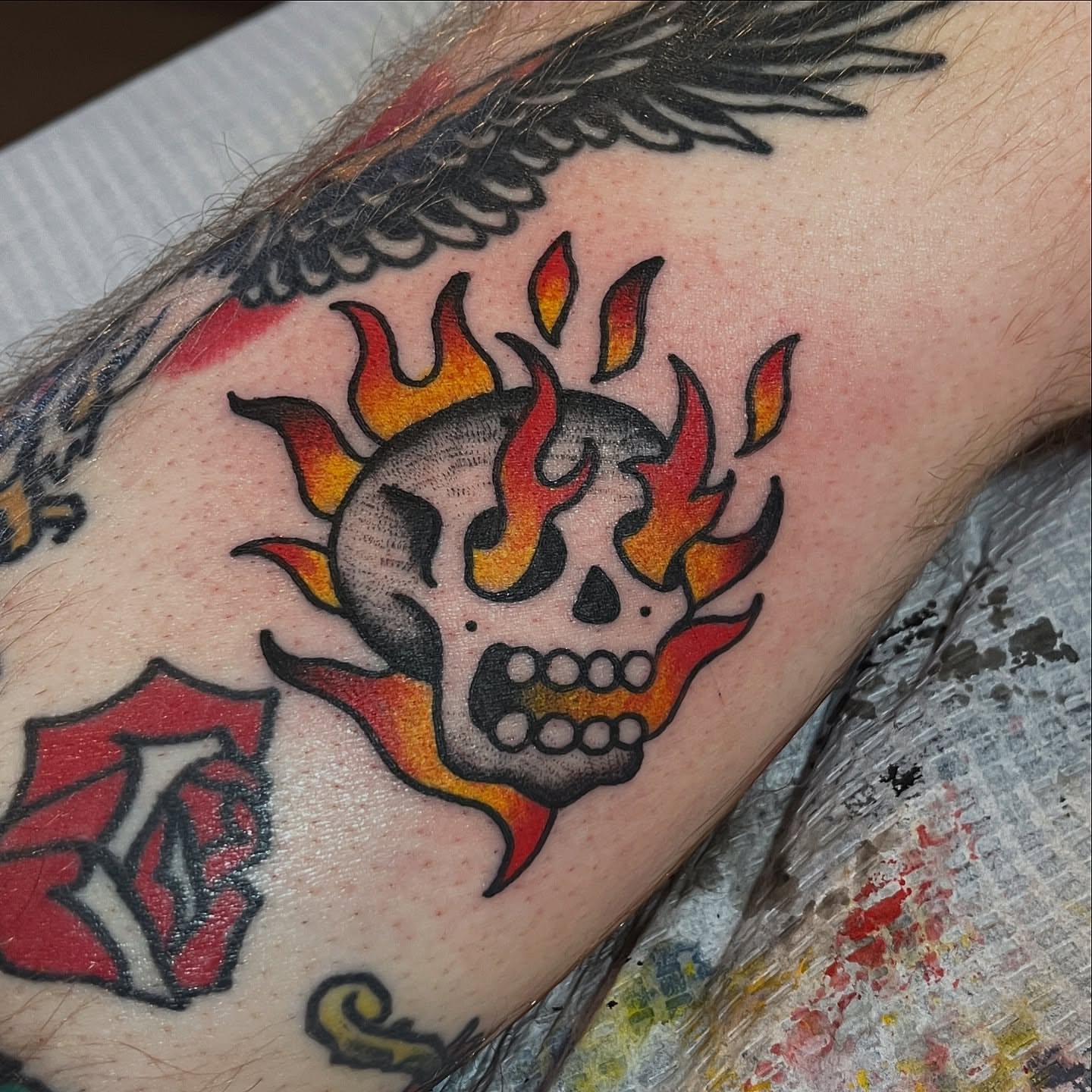 Flaming skull American traditional tattoo on the forearm by atomlenhart, Lancaster, Pennsylvania