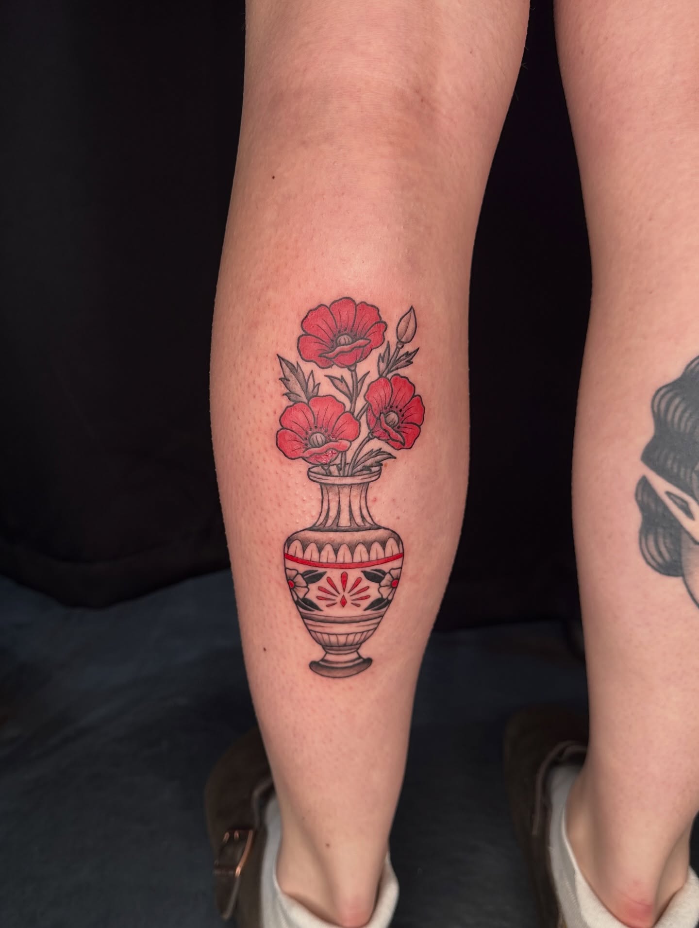 Vase with flowers American traditional tattoo on the calf by Hail Chaney, Somerville, Massachusetts