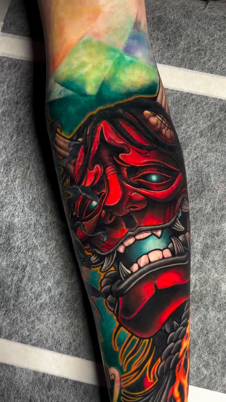 Oni mask with fiery background japanese irezumi tattoo by Jon Ronzka