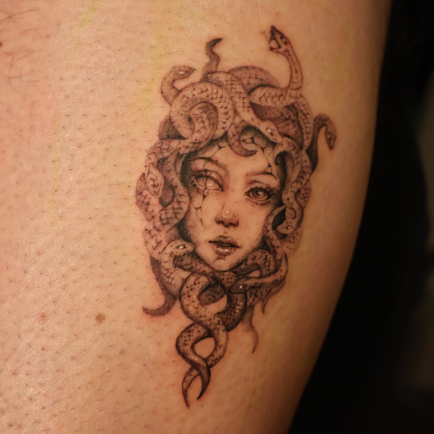 Medusa realism tattoo on the thigh by Grace Zarmina Hessam