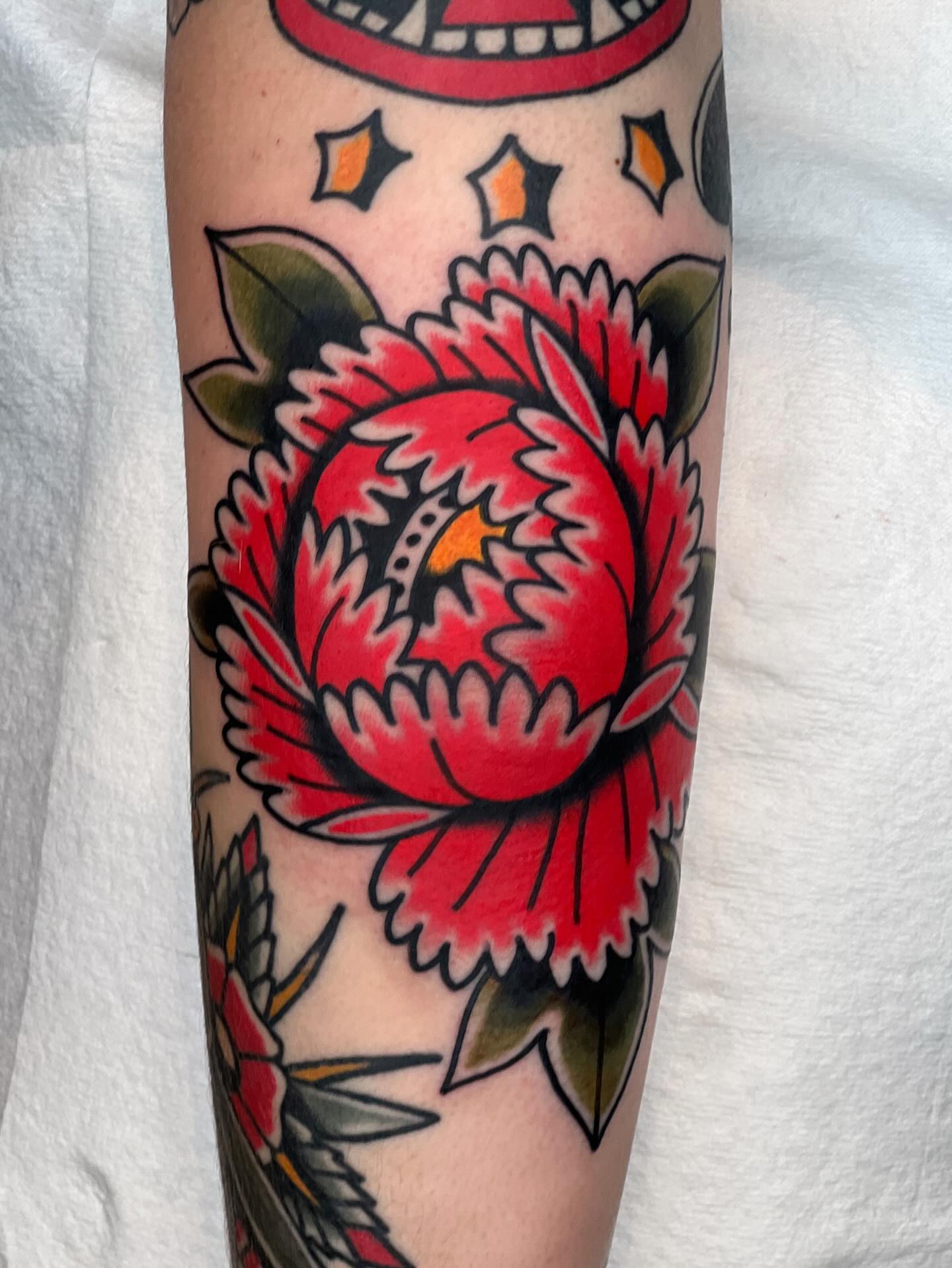 Peony American traditional tattoo on the forearm by Blake Francis, Worcester, Massachusetts