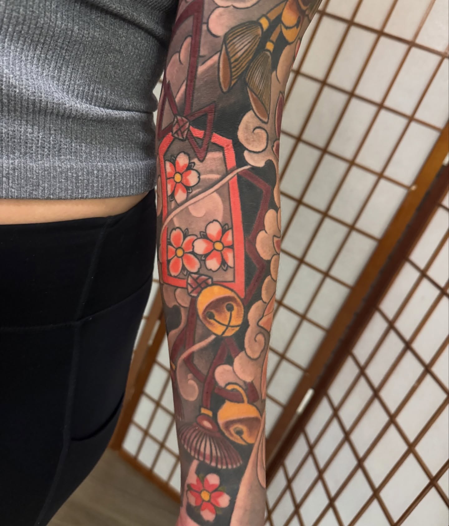 Cherry blossoms and lantern japanese irezumi tattoo on the forearm by Dylan