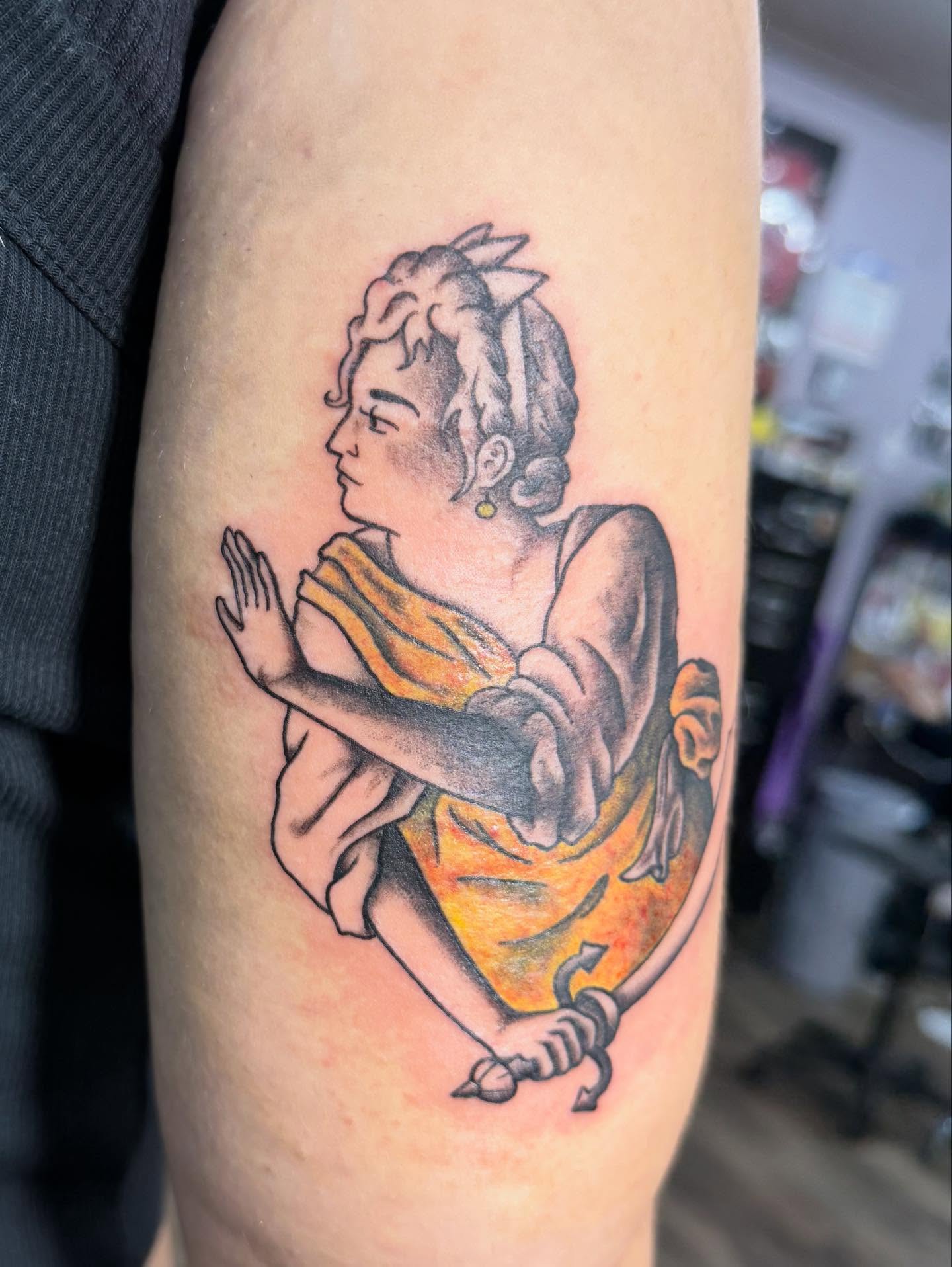 Woman praying American traditional tattoo on the forearm by Hunter Beyer