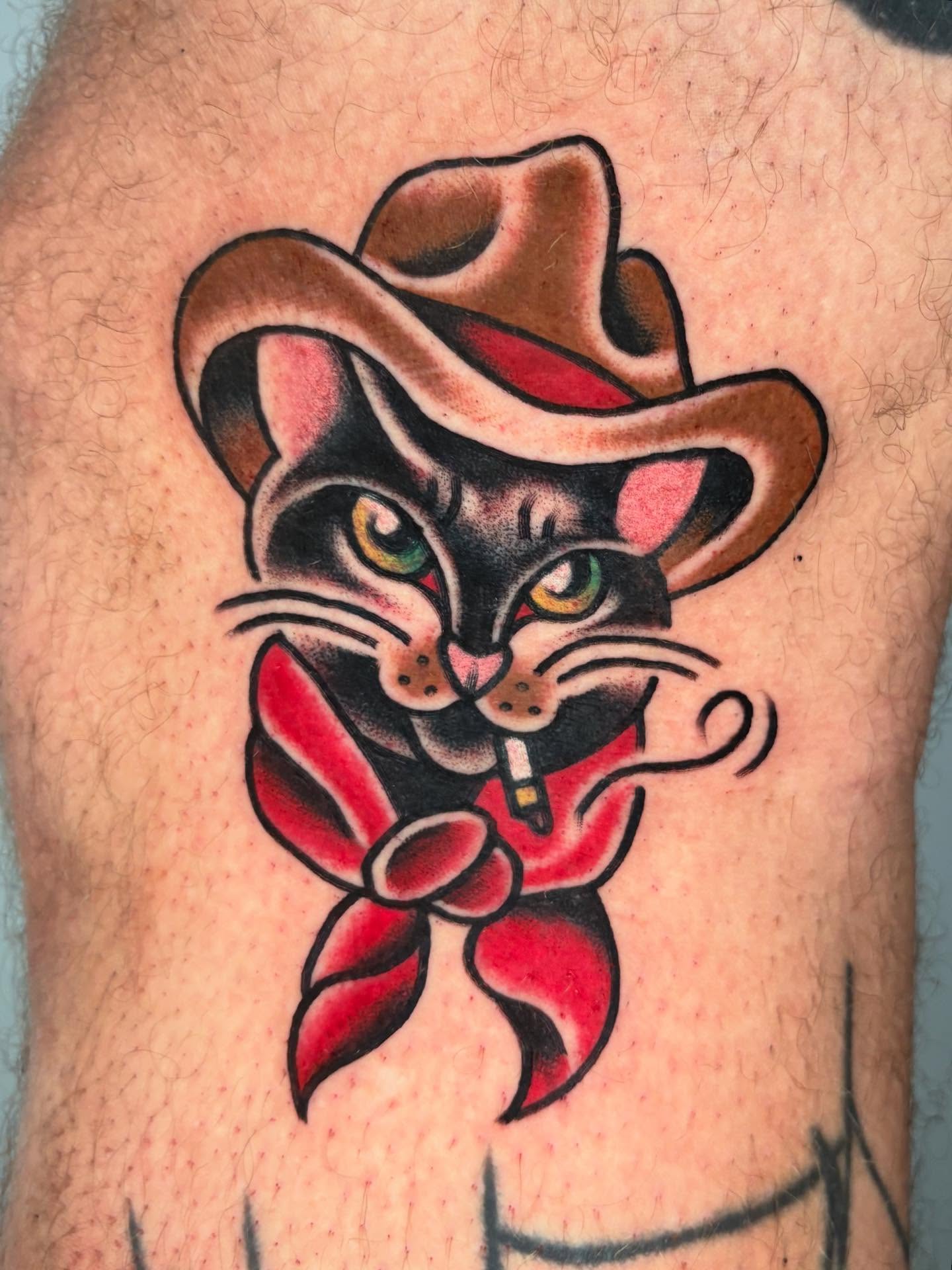 Cat wearing cowboy hat American traditional tattoo on the thigh by ๐ต๐๐๐๐ ๐ฎ๐๐๐๐๐๐, New Orleans, Louisiana