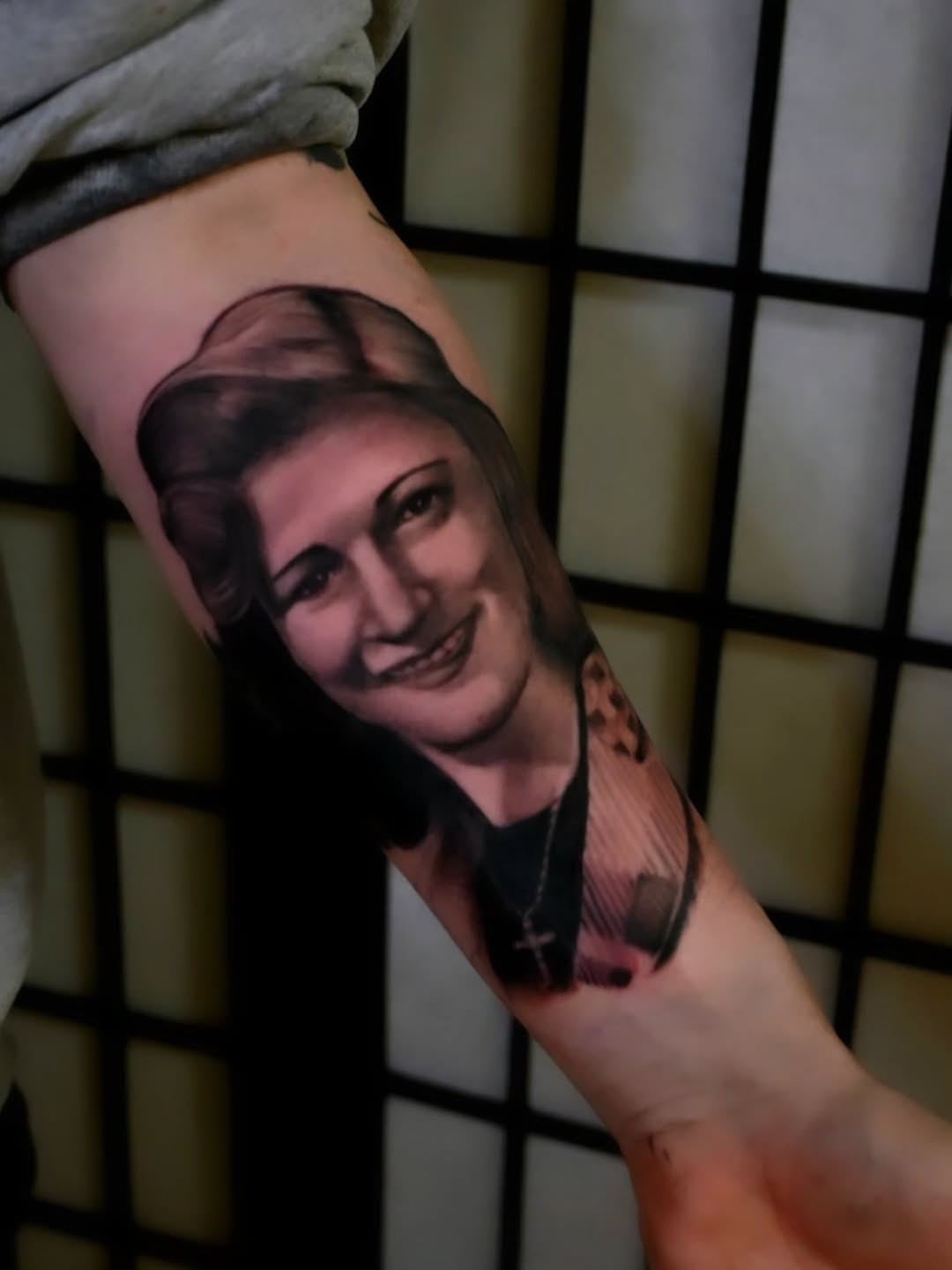 Portrait realism tattoo on the forearm by Michael ORegan