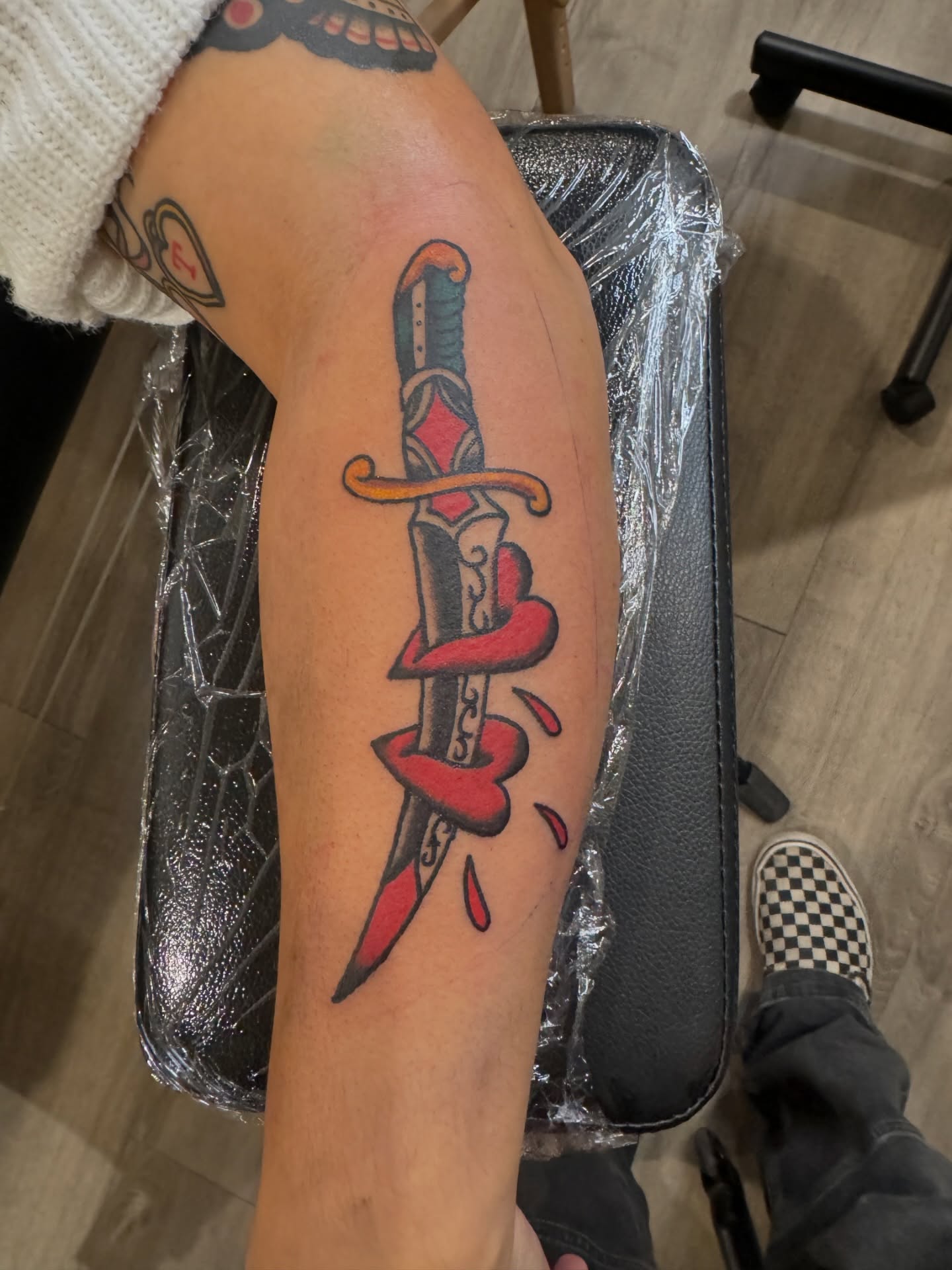 Knife and snake American traditional tattoo on the forearm by Minneapolis