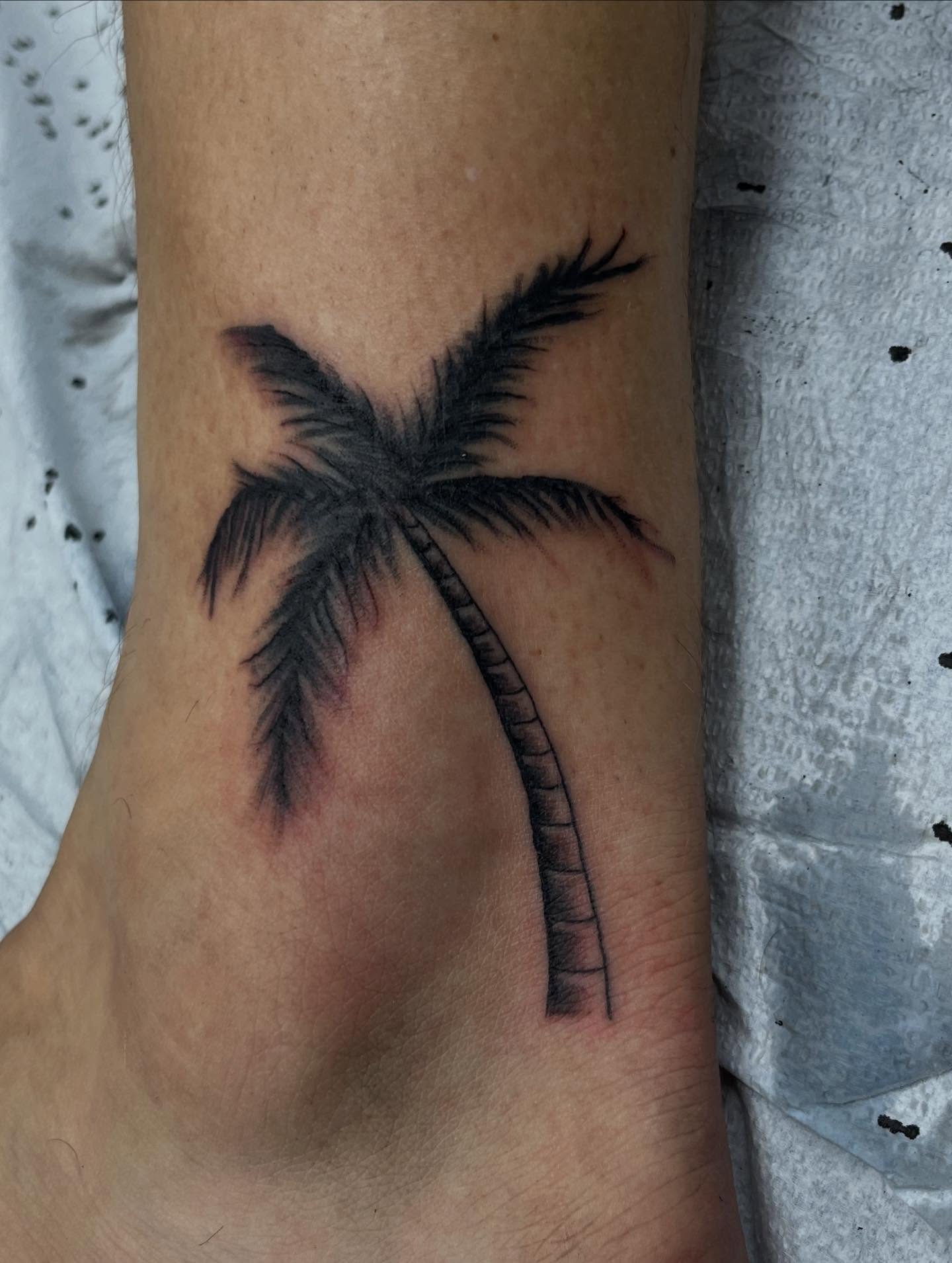 Palm tree black and grey tattoo on the forearm by Franky Sharpz