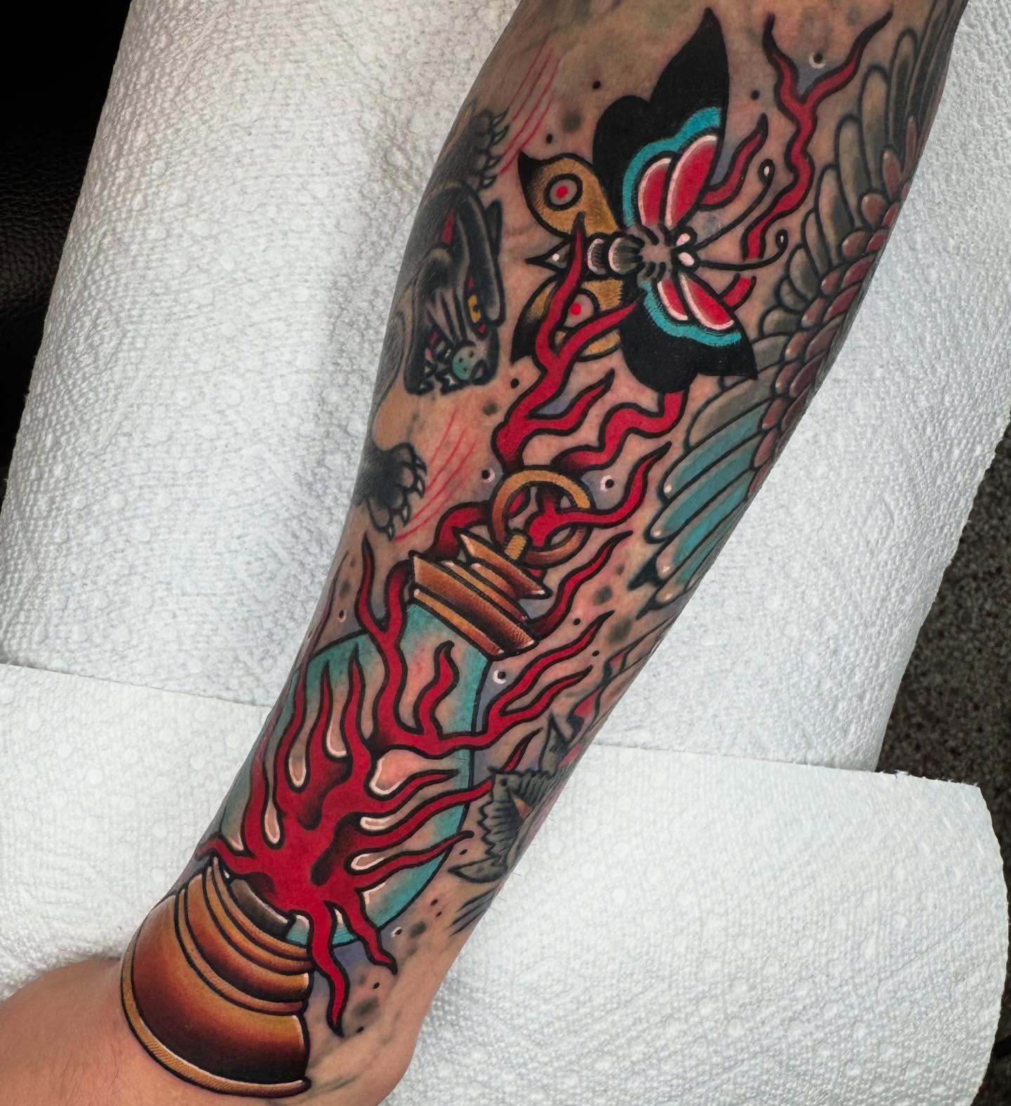 Octopus and lantern American traditional tattoo on the forearm by Graham Edward Vogel