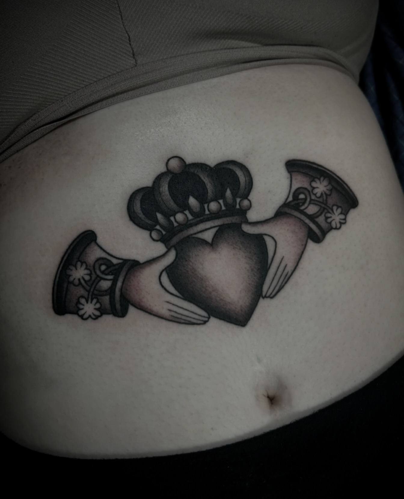 Claddagh ring black and grey tattoo on the torso by ꧁𝙺𝚊𝚛𝚒𝚗𝚊꧂, Grinnell, Iowa