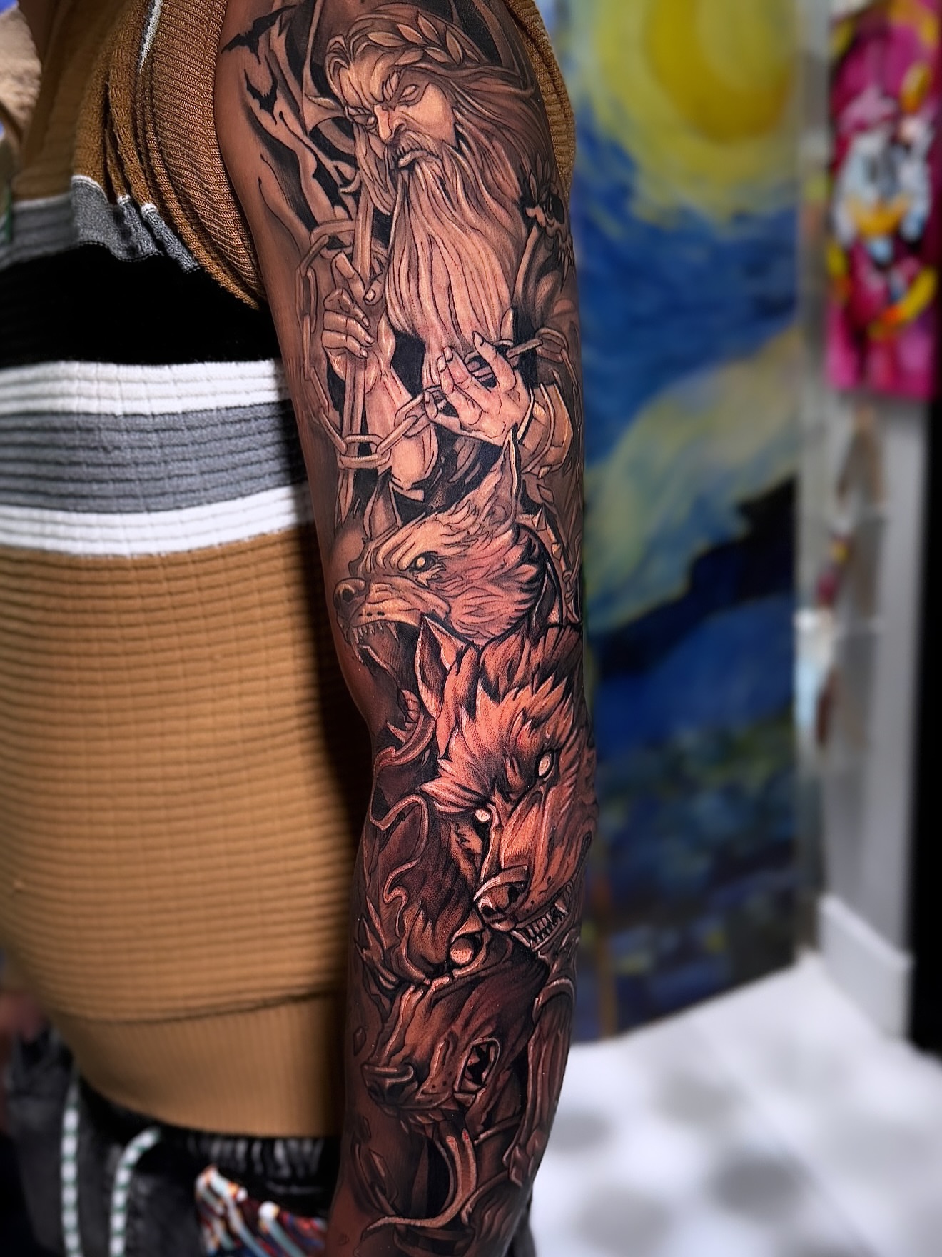 Mythical figure with wolves realism tattoo on the forearm by Eyinay Cabezas 🇨🇺🇺🇸