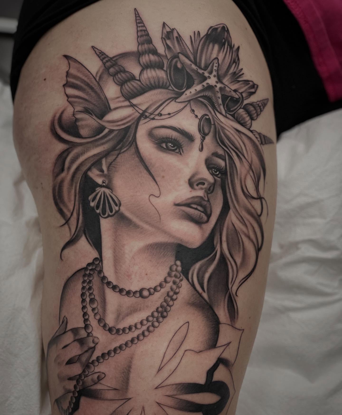 Mermaid realism tattoo on the thigh by ๐ณ๐๐๐๐ข ๐ต๐๐๐๐๐๐