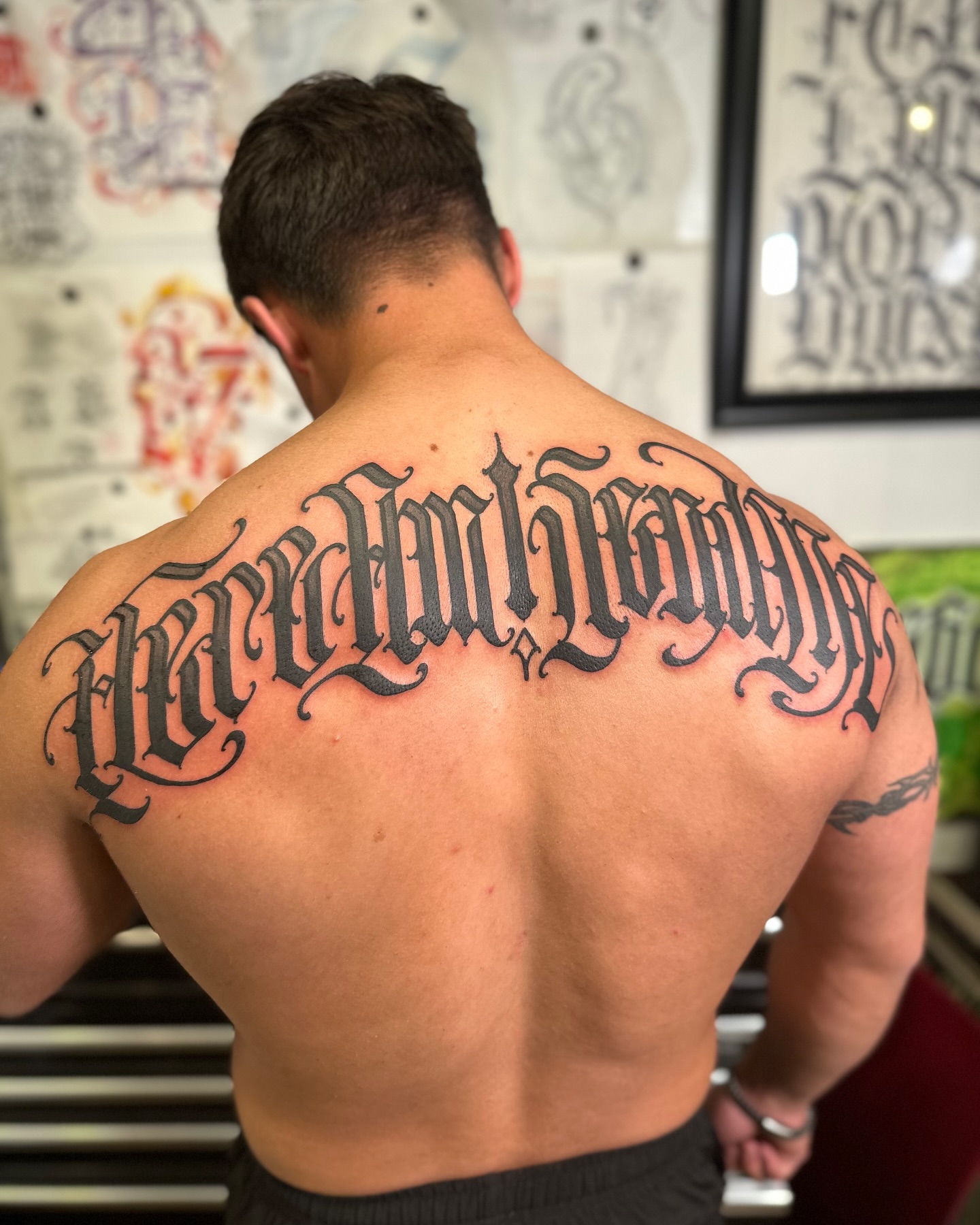 Script lettering lettering script tattoo on the back by Tattoos By Deft