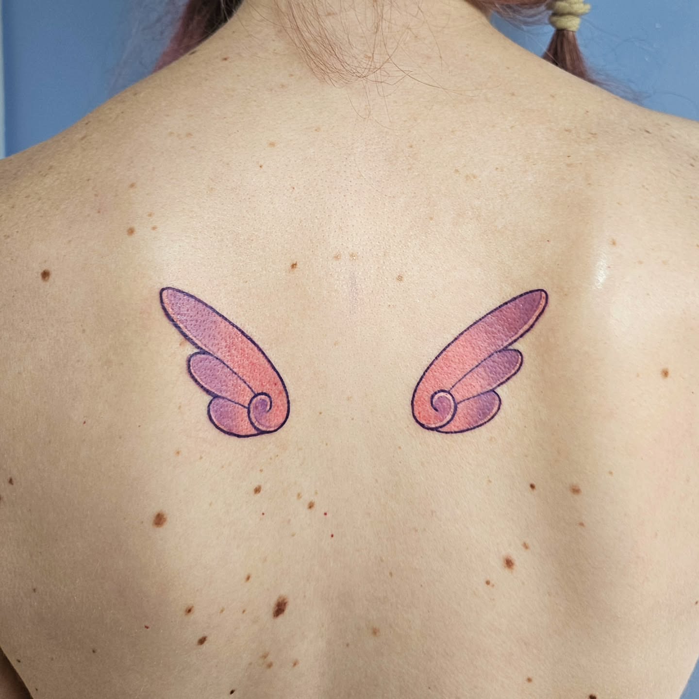 Wings dotwork tattoo on the back by Gray