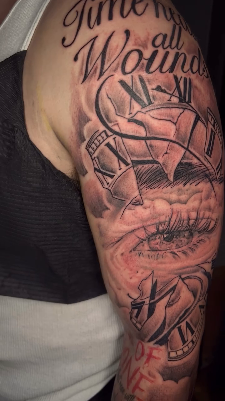Clock and eye with text lettering script tattoo by Jakobi