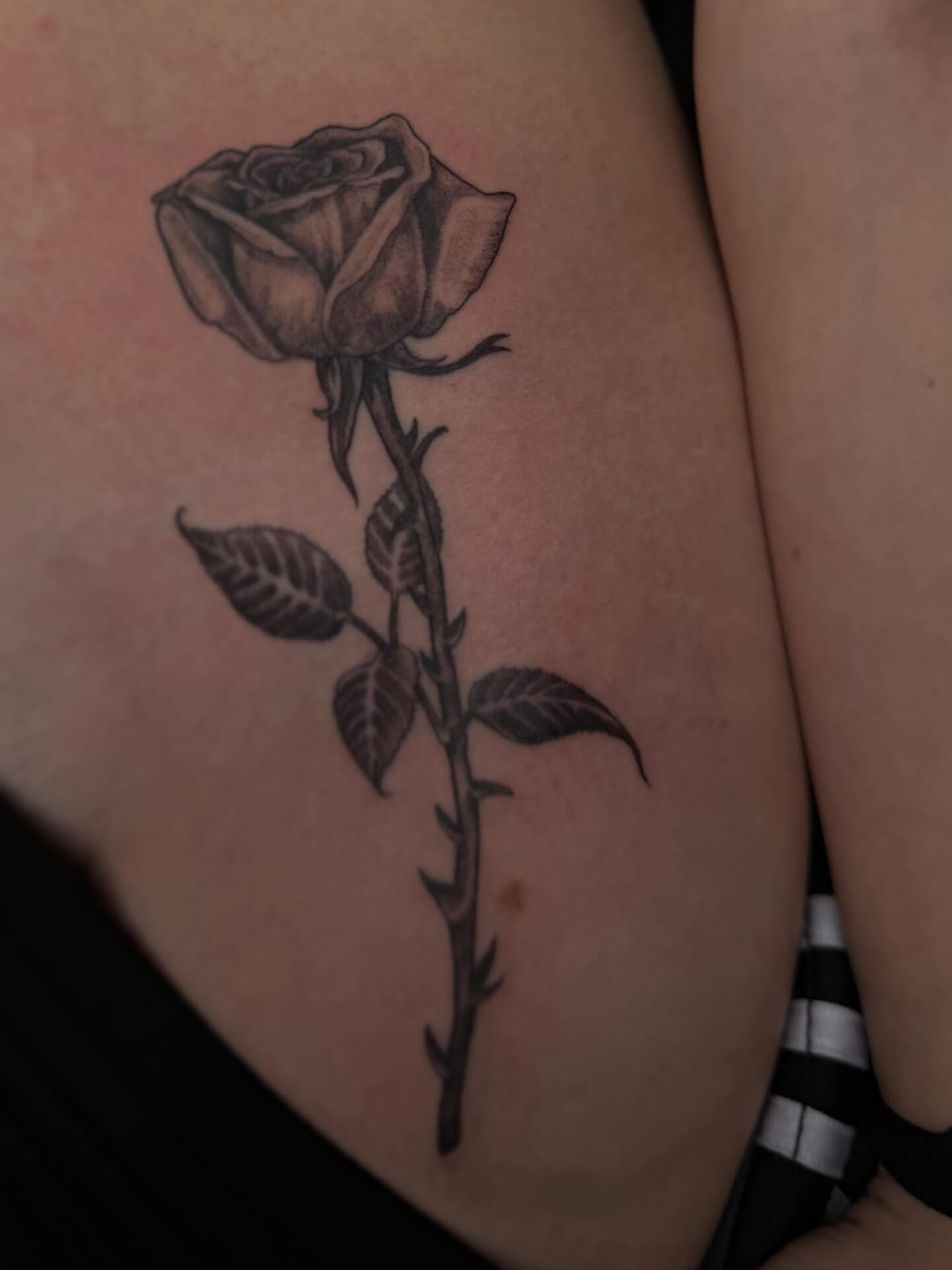 Rose realism tattoo on the thigh by Cort Prescott 🕸 OKC Tattoo Artist, Oklahoma City, Oklahoma