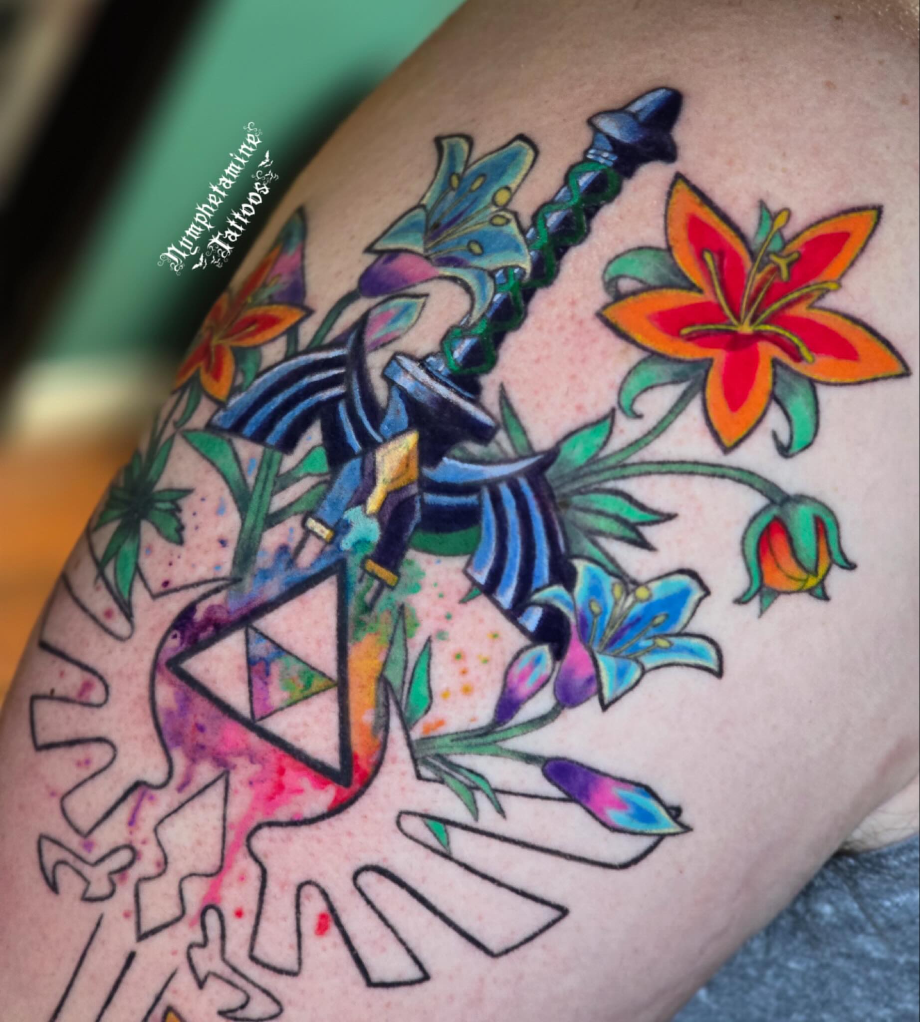 Sword and flowers watercolor tattoo on the thigh by ๐ธ๐๐๐๐๐๐๐๐