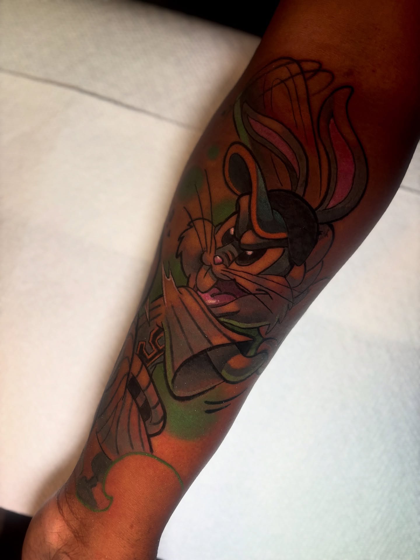 Looney tunes character illustrative tattoo on the forearm by ππ§π