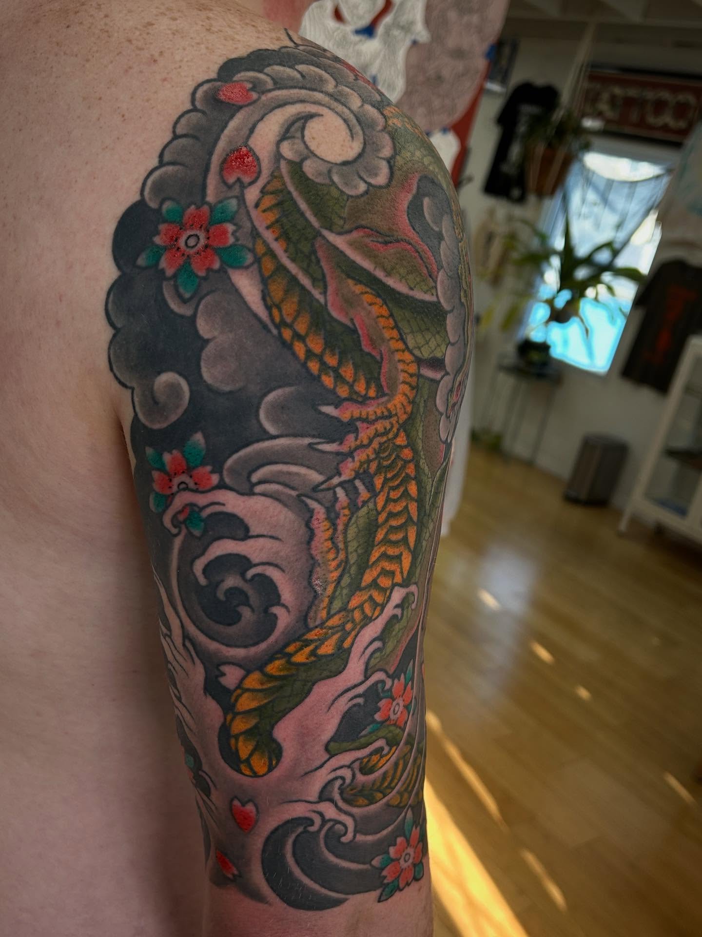 Koi fish japanese irezumi tattoo on the forearm by Matthew Crimson