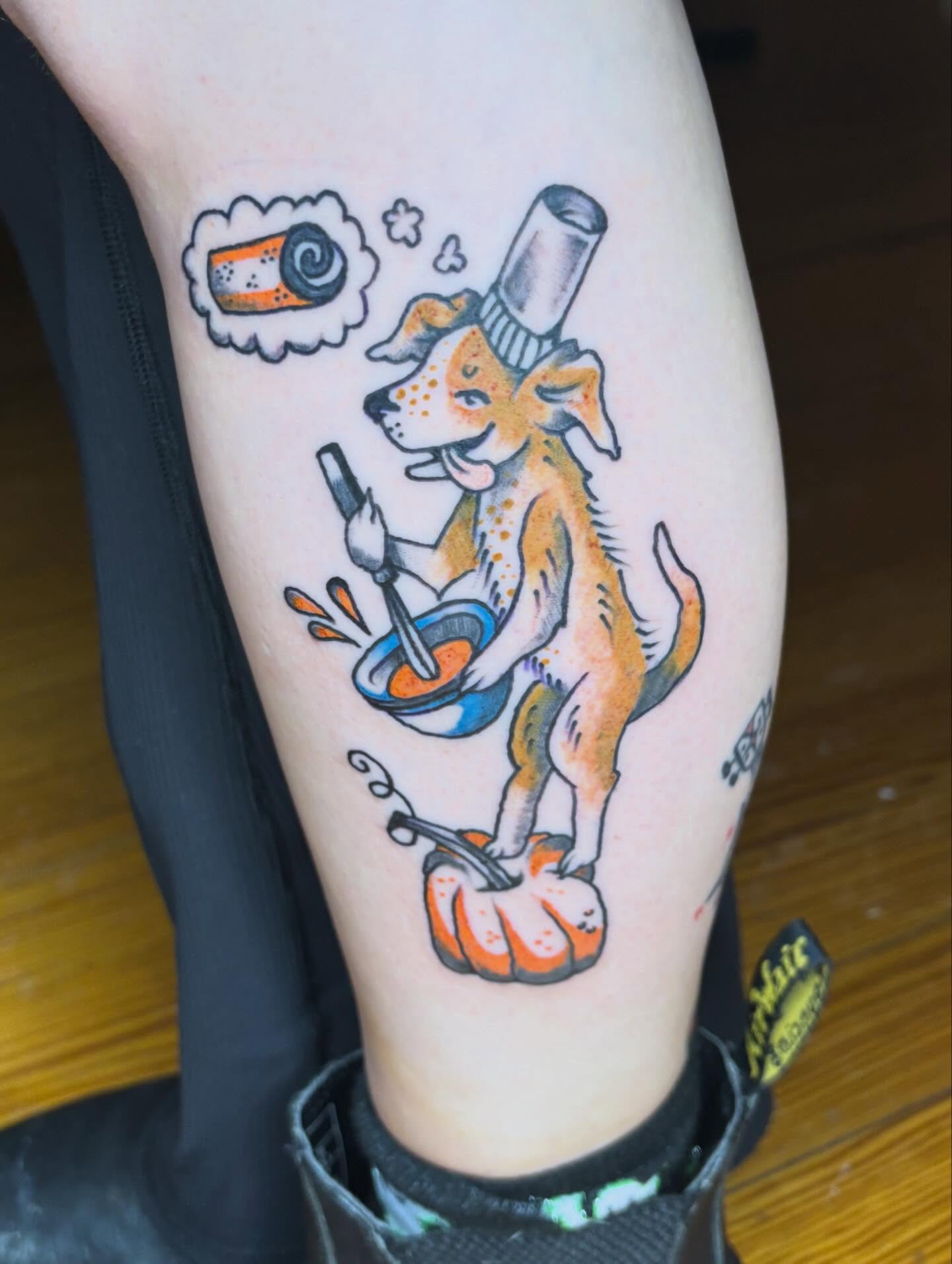 Dog cooking American traditional tattoo on the thigh by kris noble floyd
