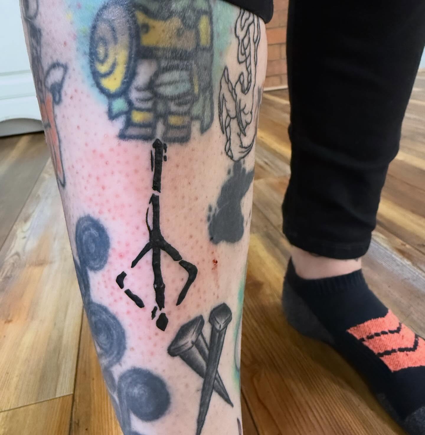 Nail and hammer dotwork tattoo on the forearm by Liz🗡️Fort Collins🗡️Tattoo Apprentice