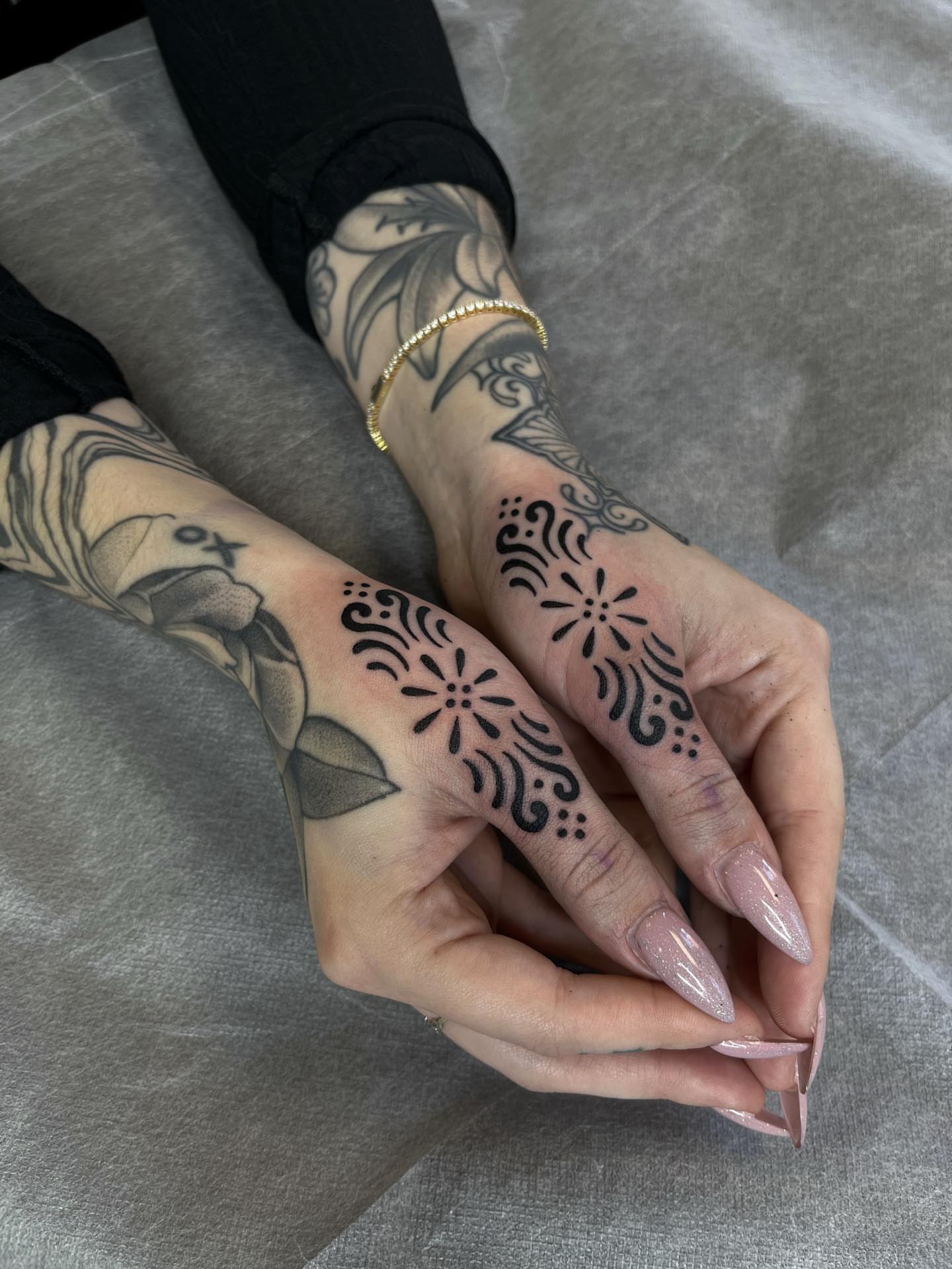Floral pattern black and grey tattoo on the hand by ✣ Liz Karn ✣