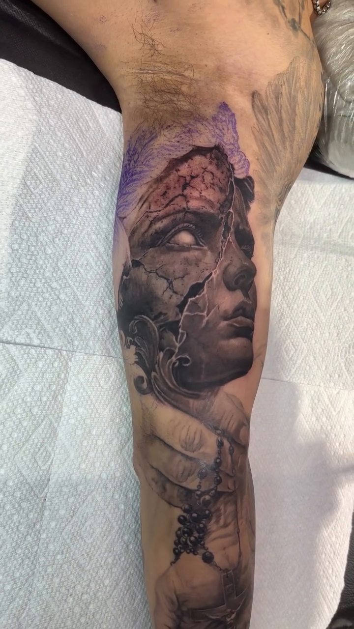 Tattoo by @vudoo_tattoo — dark_realism, black_and_grey