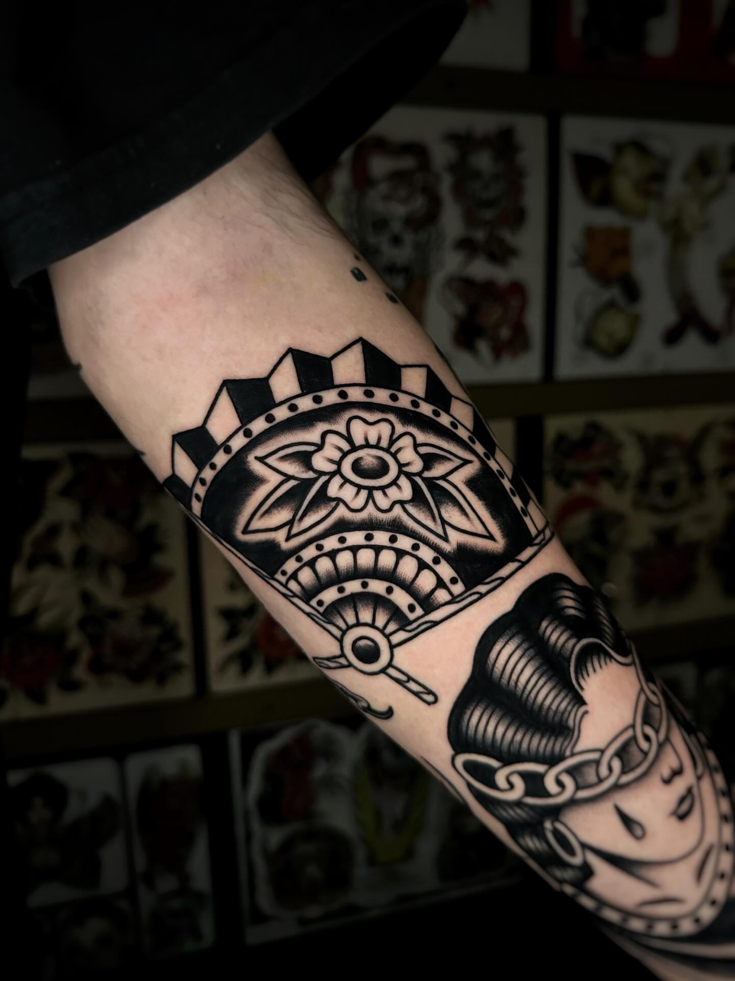 Geometric mandala American traditional tattoo on the forearm by Alex Finnerty, Reading, Massachusetts