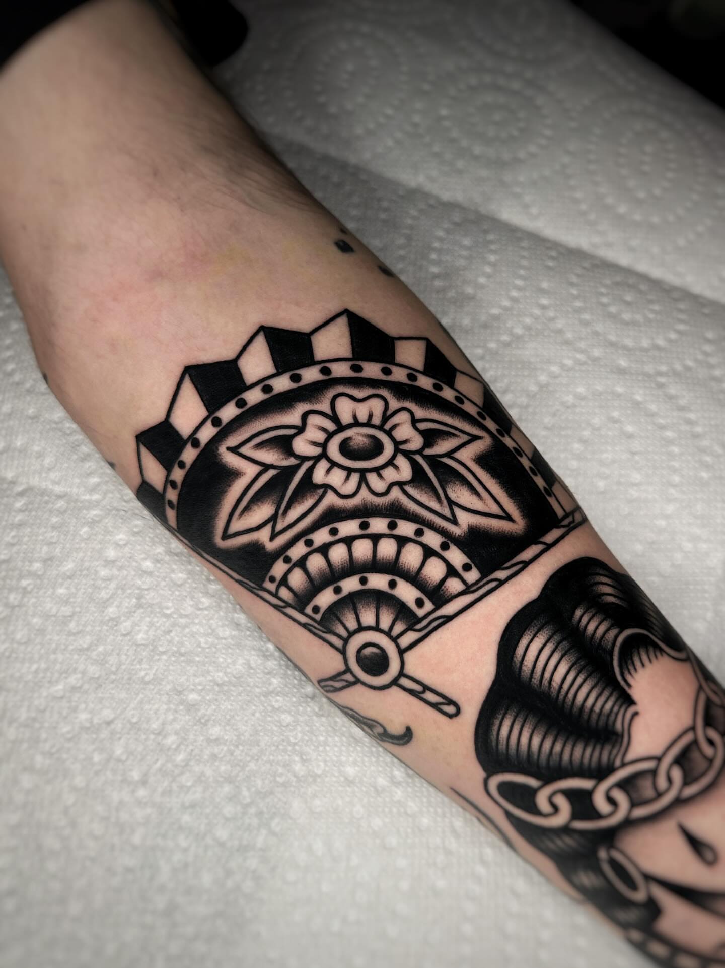 Geometric mandala geometric tattoo on the forearm by Alex Finnerty, Reading, Massachusetts